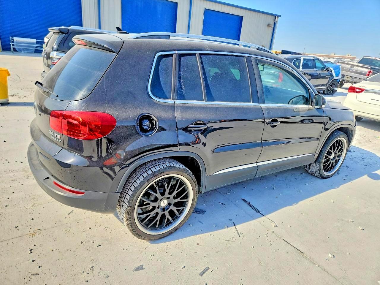 2014 Volkswagen Tiguan S Black vin: WVGAV3AX7EW528024