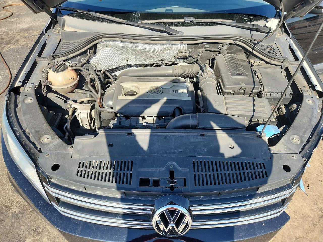 2013 Volkswagen Tiguan S Черный vin: WVGAV3AX8DW600900