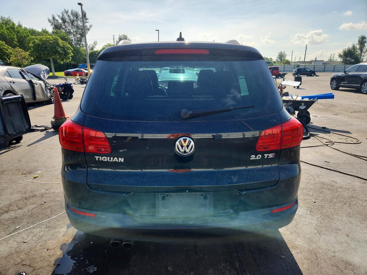 2013 Volkswagen Tiguan S Черный vin: WVGAV3AX8DW600900