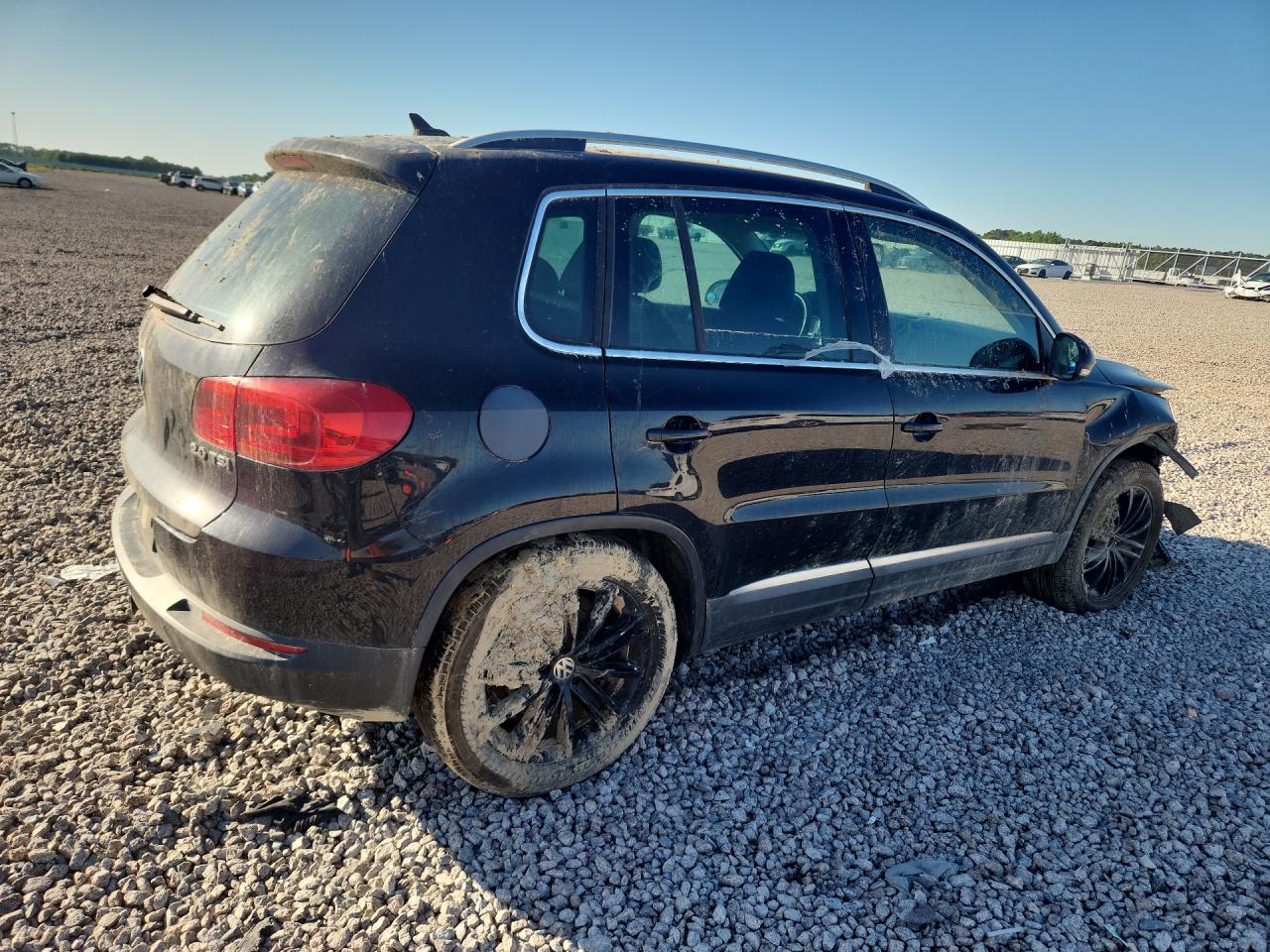 2014 Volkswagen Tiguan S Black vin: WVGAV3AX9EW558660