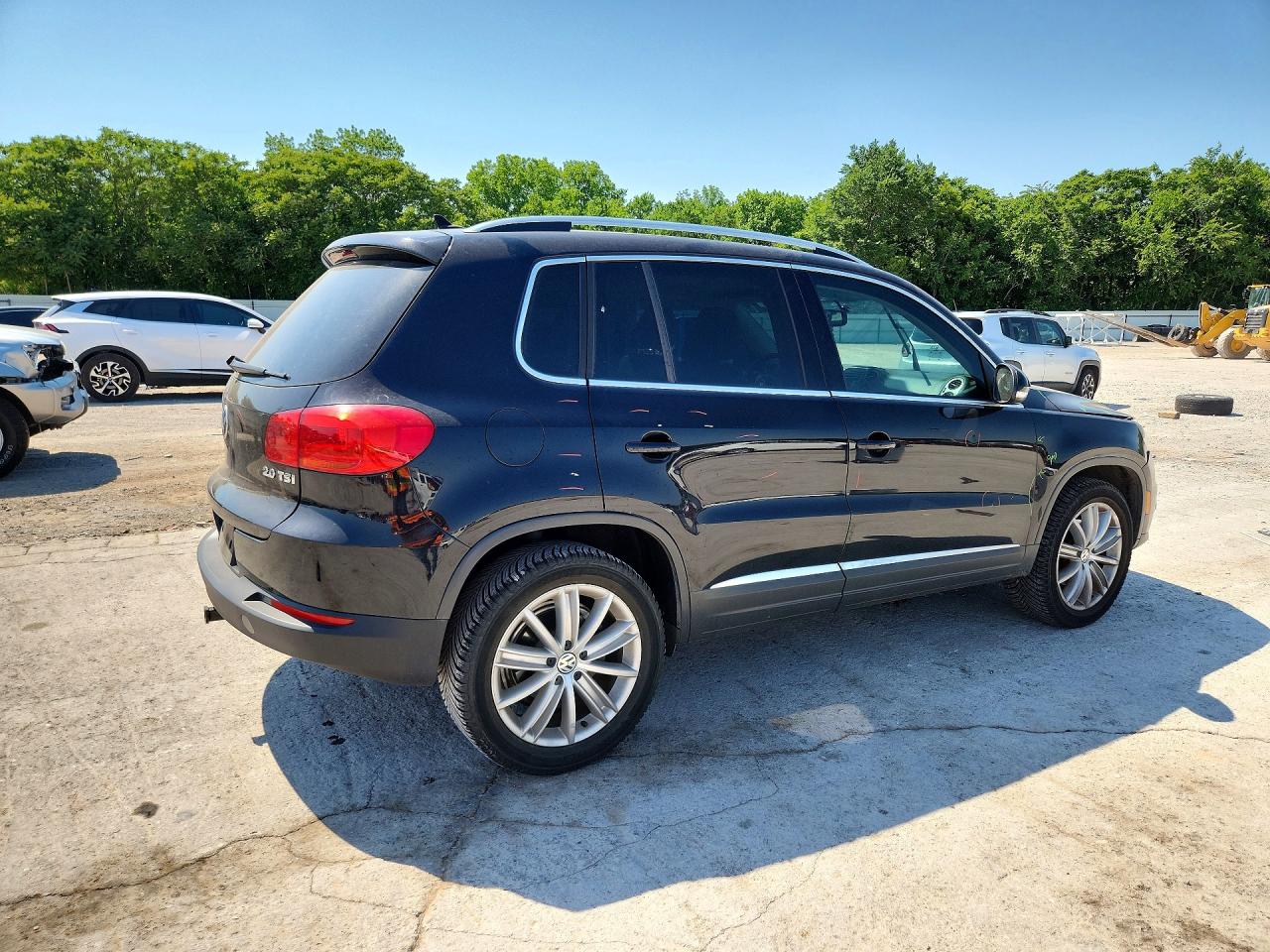 2013 Volkswagen Tiguan S Черный vin: WVGAV3AXXDW569861