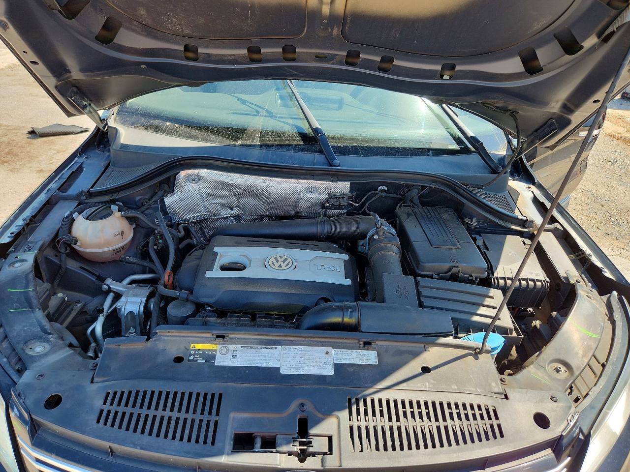 2013 Volkswagen Tiguan S Черный vin: WVGAV3AXXDW569861