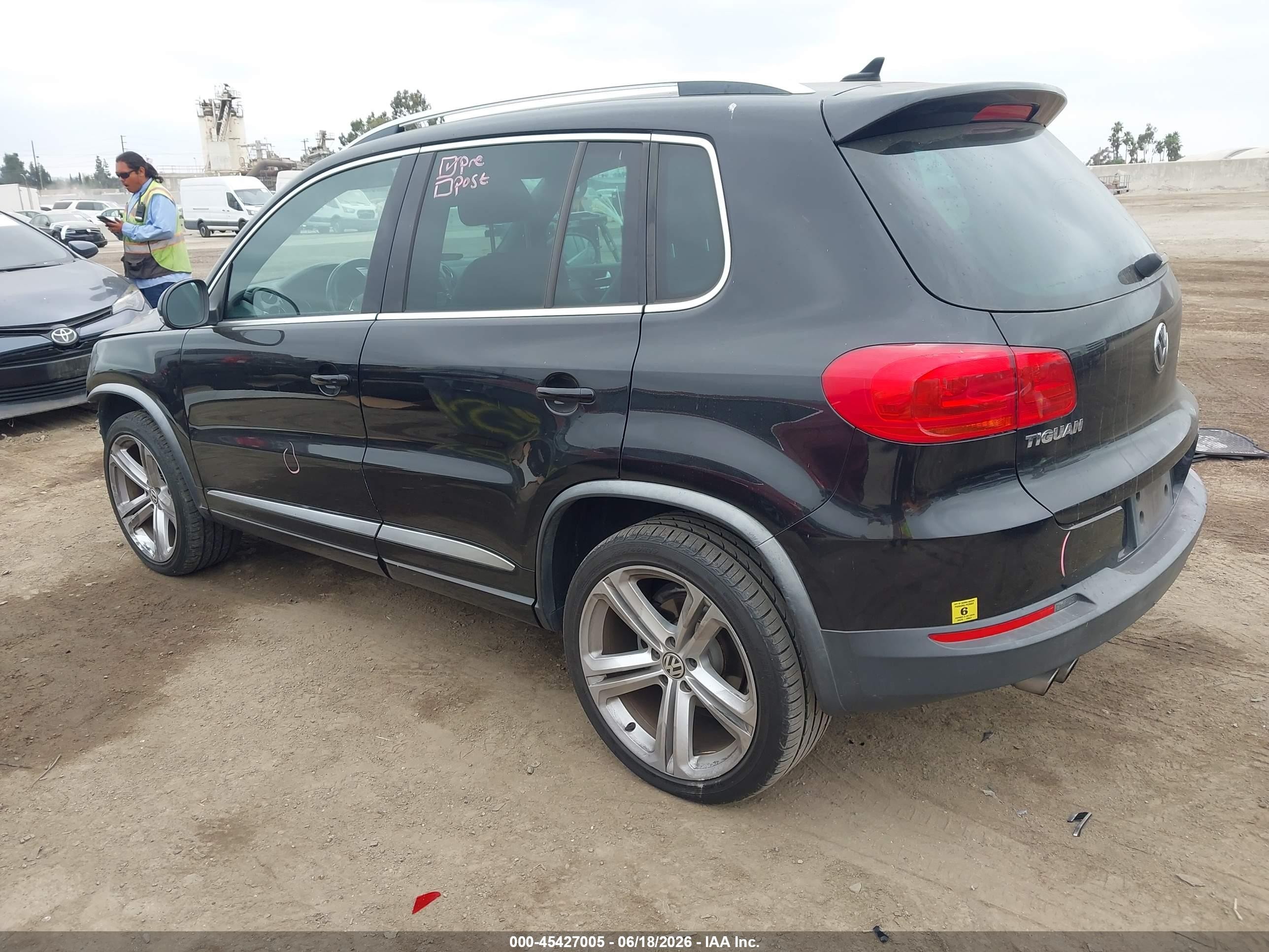2014 Volkswagen Tiguan R-line Black vin: WVGAV3AXXEW071192