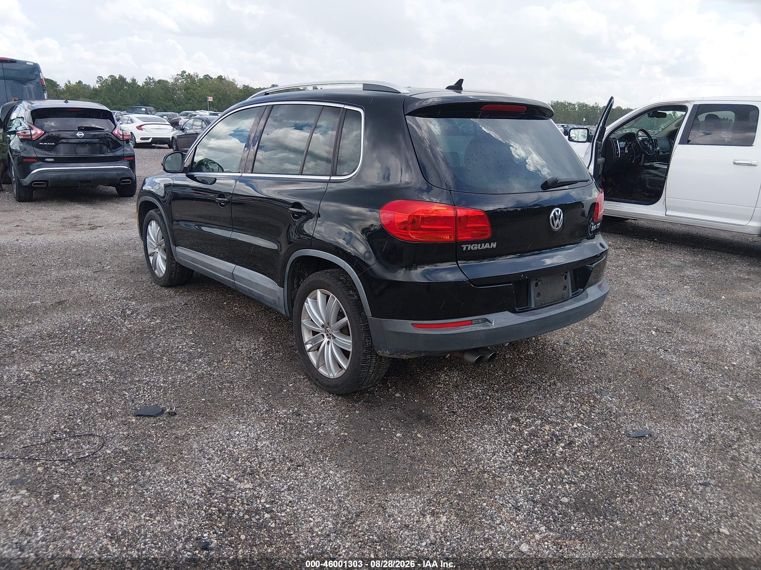 2014 Volkswagen Tiguan Sel Black vin: WVGAV3AXXEW559896