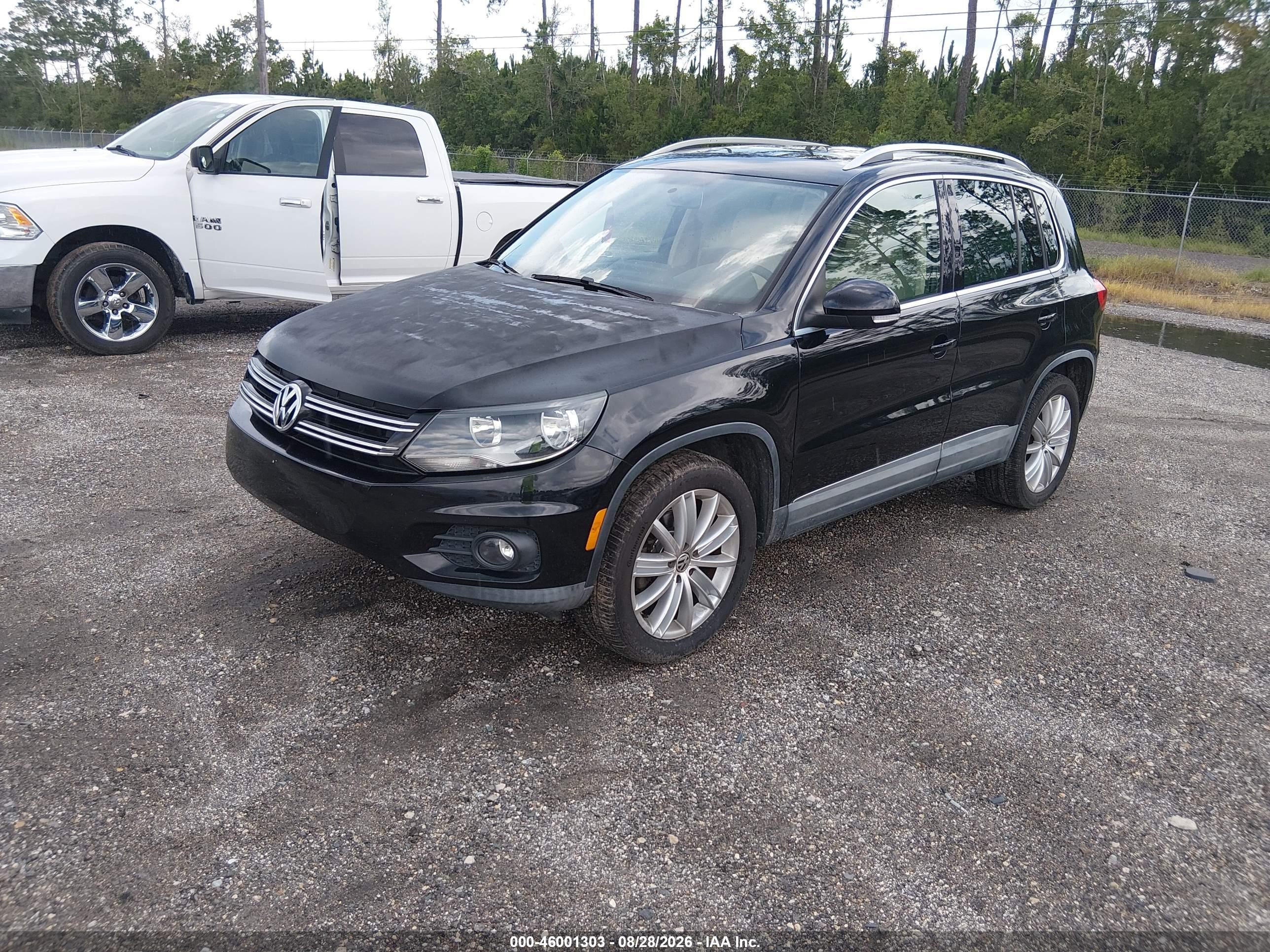 2014 Volkswagen Tiguan Sel Black vin: WVGAV3AXXEW559896