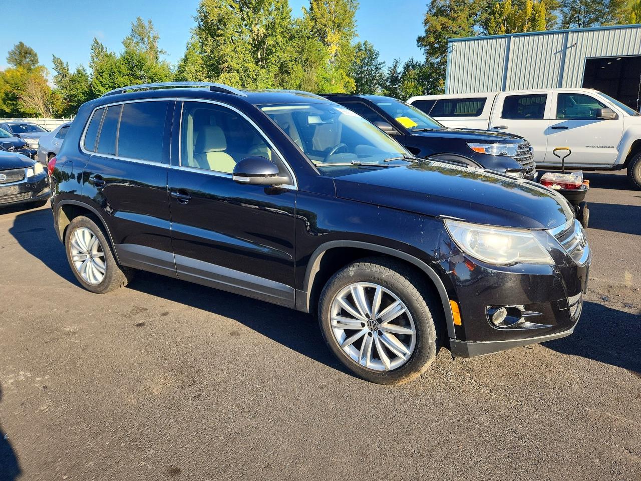 2009 Volkswagen Tiguan S Черный vin: WVGAV75N09W502662