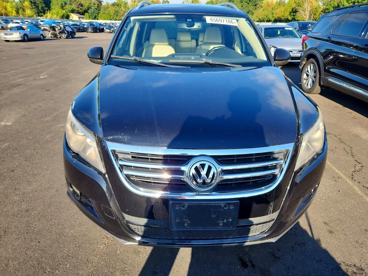 2009 Volkswagen Tiguan S Черный vin: WVGAV75N09W502662