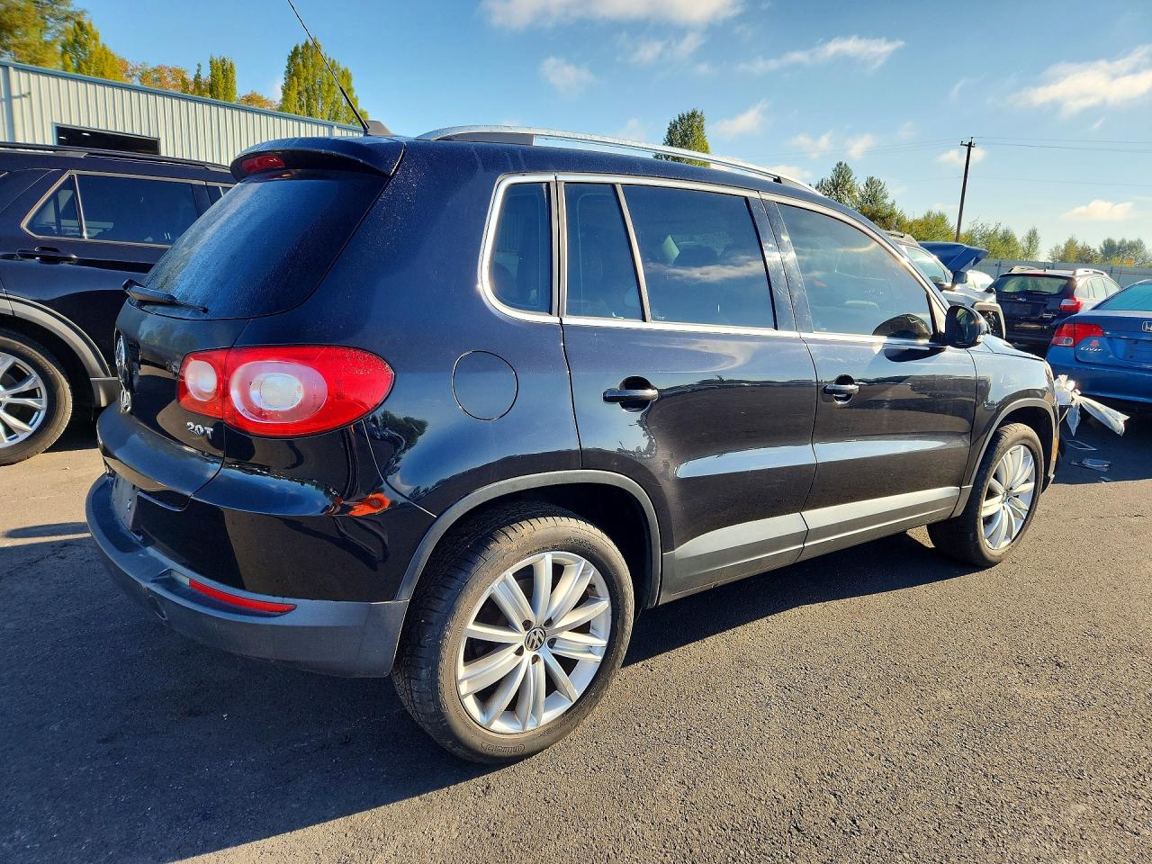 2009 Volkswagen Tiguan S Черный vin: WVGAV75N09W502662