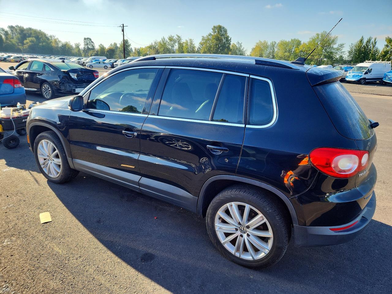 2009 Volkswagen Tiguan S Черный vin: WVGAV75N09W502662