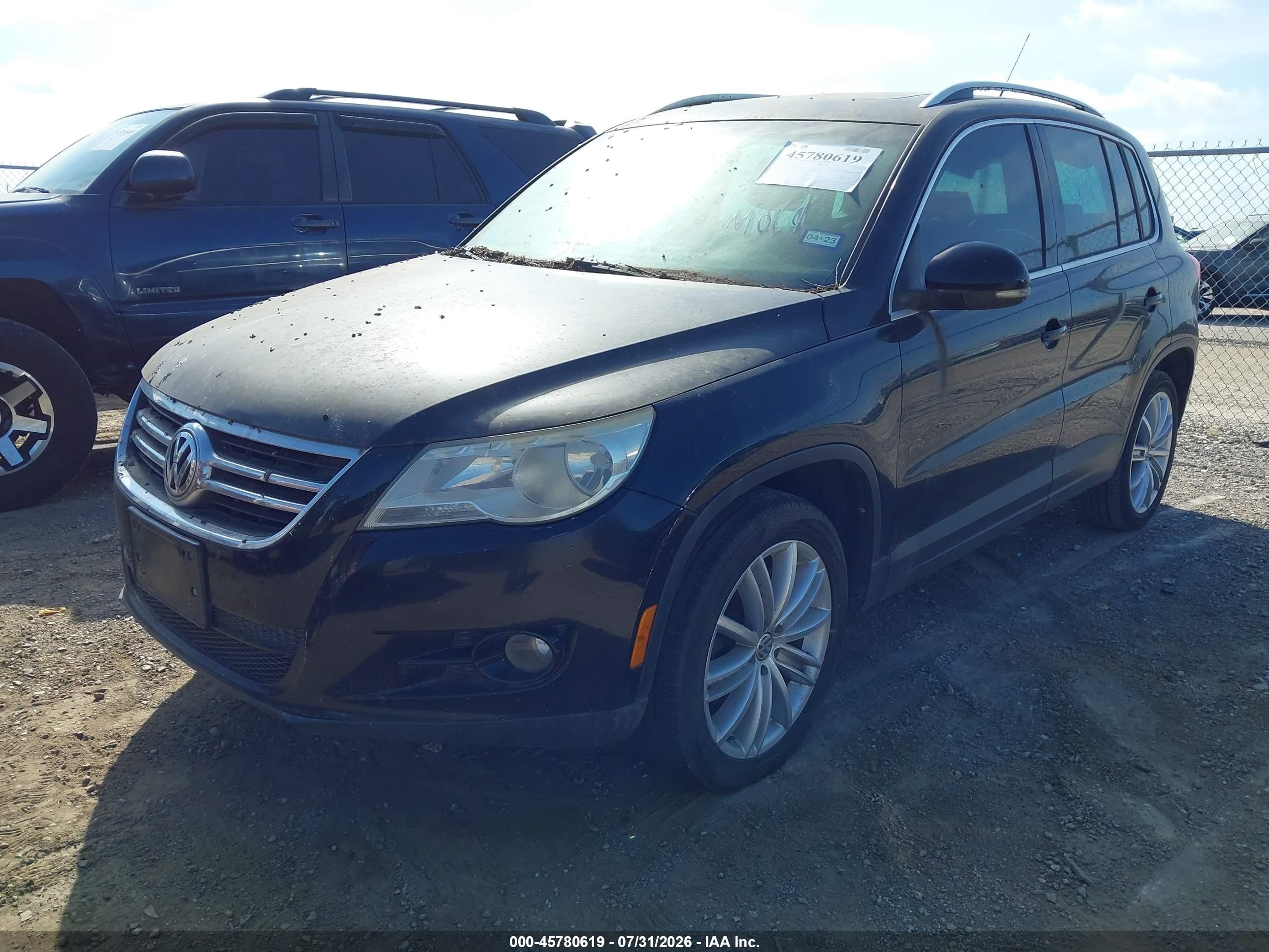 2009 Volkswagen Tiguan Se Black vin: WVGAV75NX9W526533