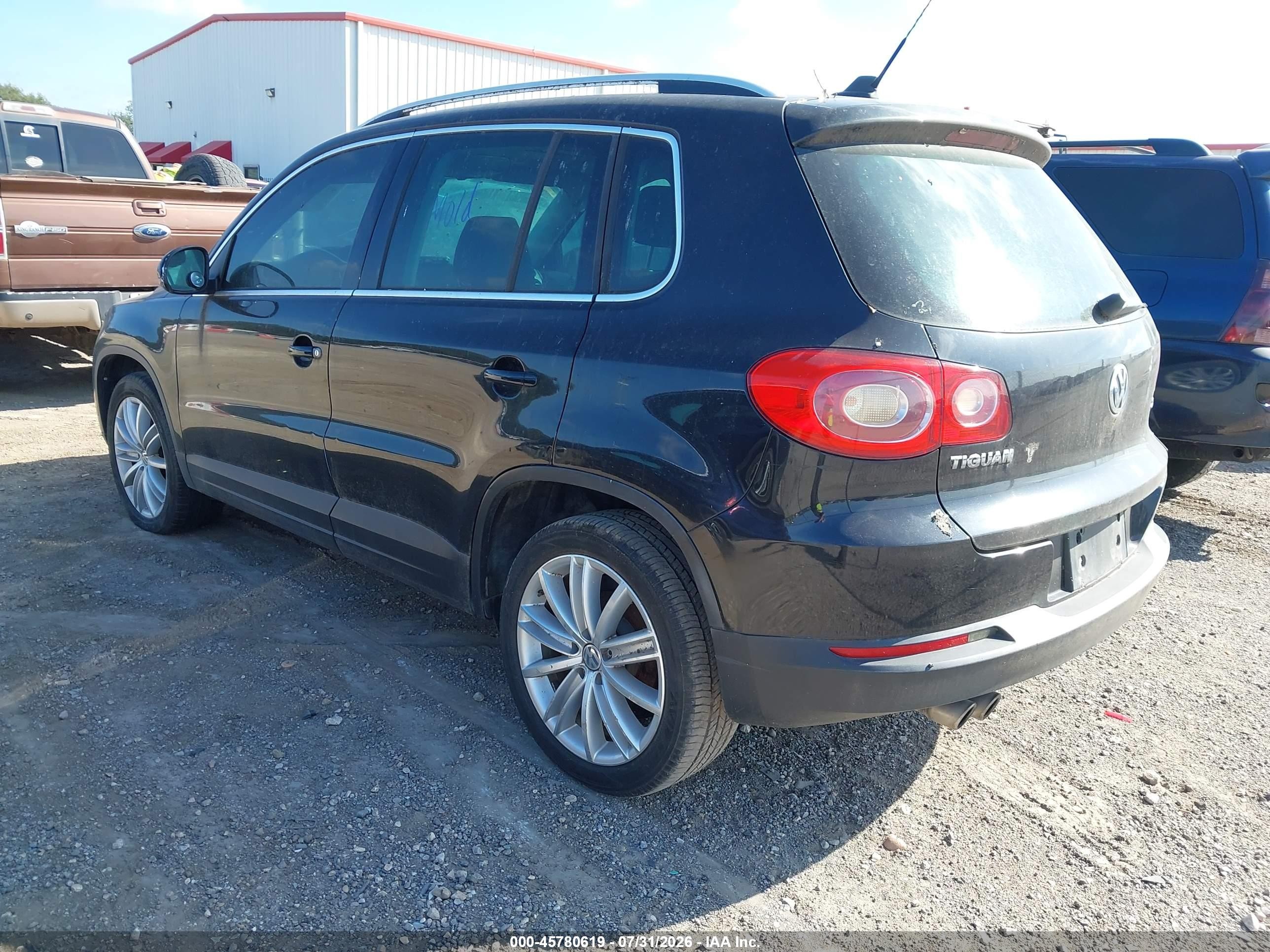2009 Volkswagen Tiguan Se Black vin: WVGAV75NX9W526533