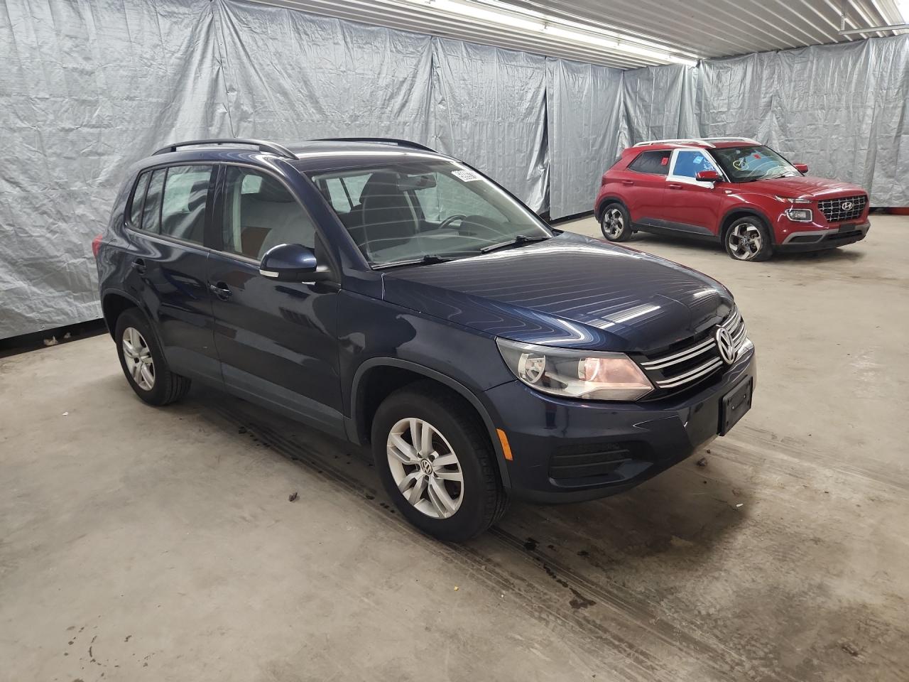 2015 Volkswagen Tiguan S Blue vin: WVGAV7AX0FW595475 Damage: Right Rear Door, Chipped, 1