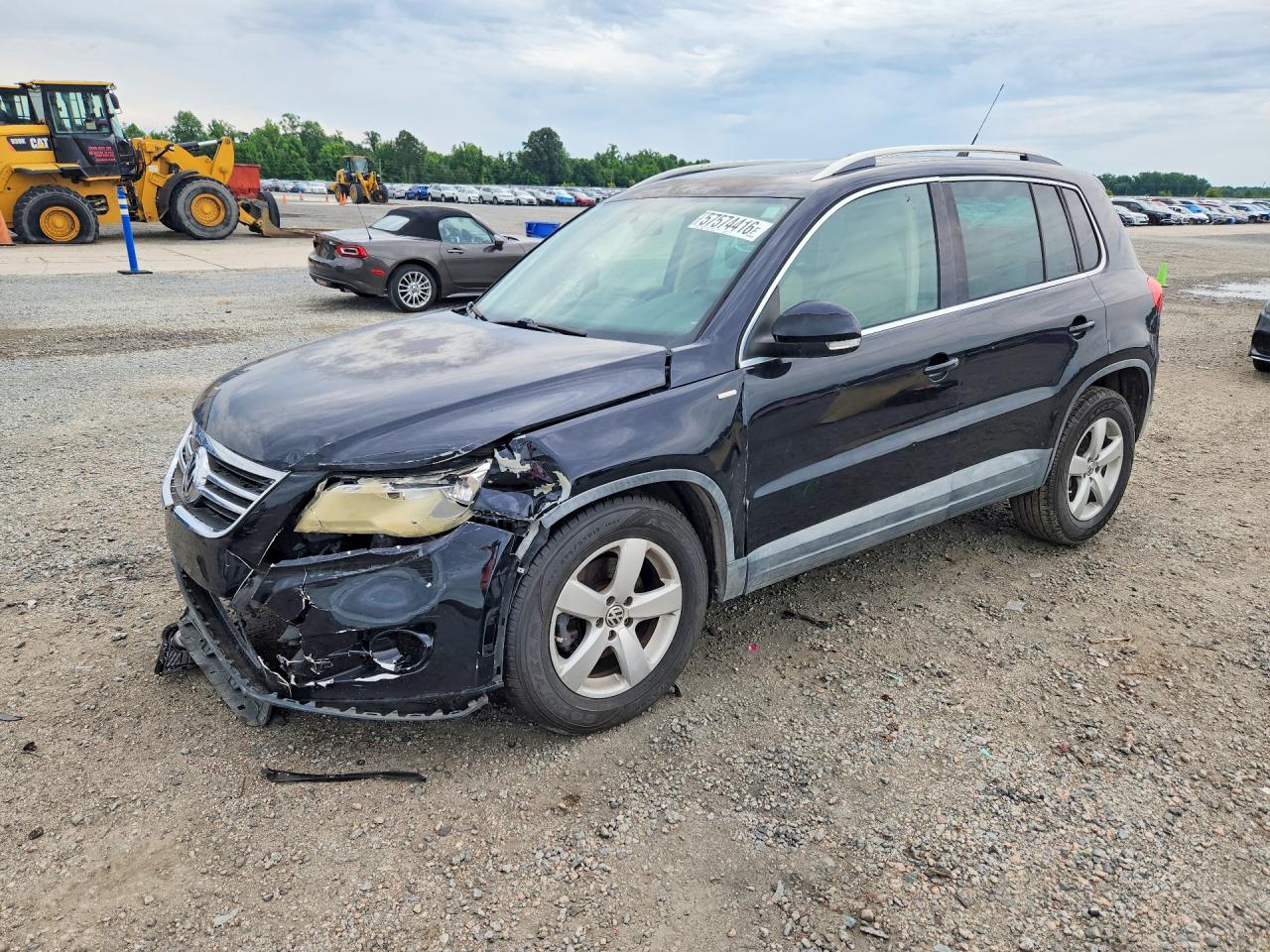 2010 Volkswagen Tiguan S Черный vin: WVGAV7AX1AW001677