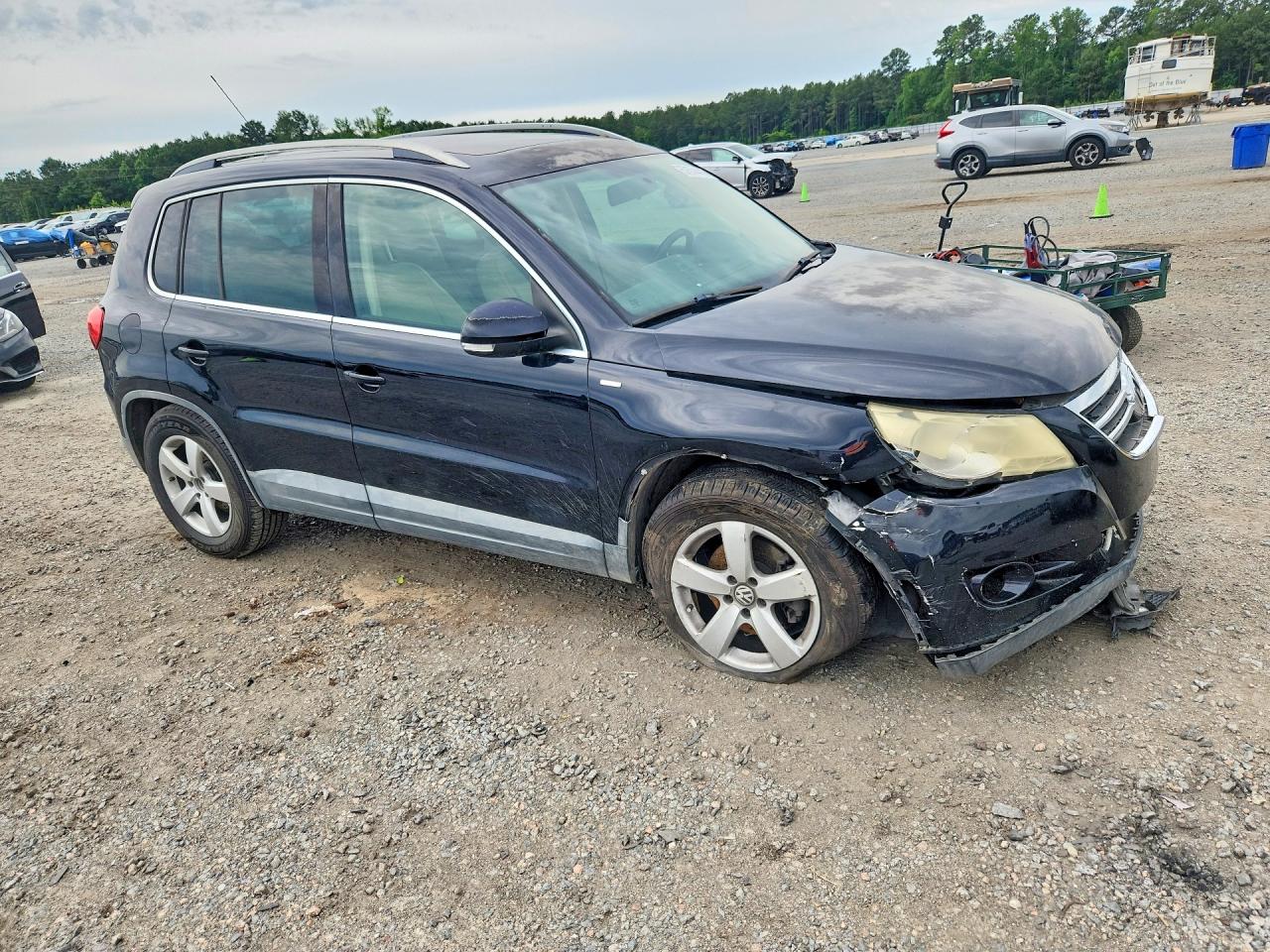 2010 Volkswagen Tiguan S Черный vin: WVGAV7AX1AW001677