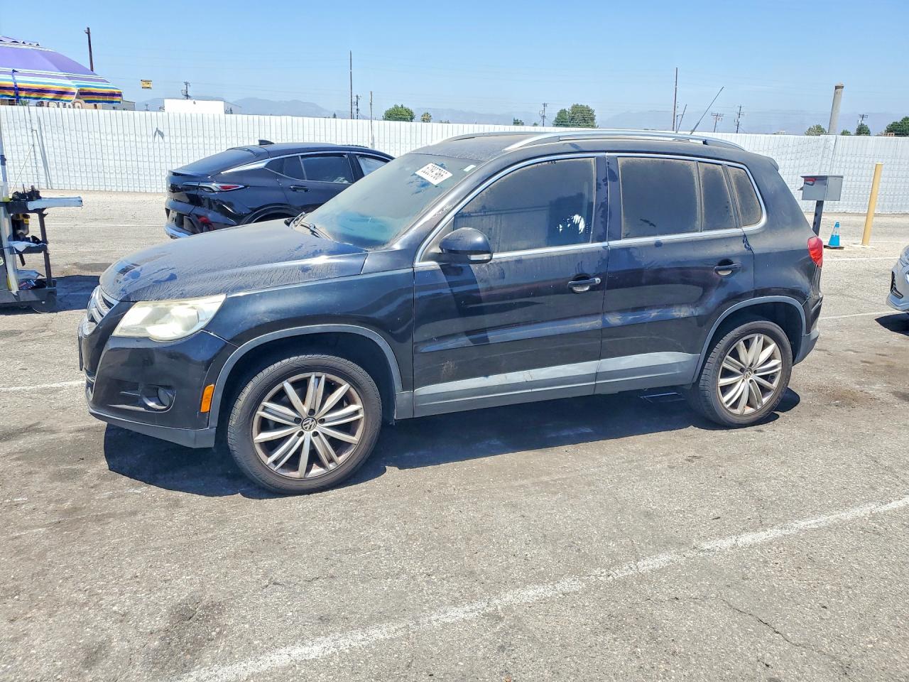 2010 Volkswagen Tiguan S Black vin: WVGAV7AX1AW525167