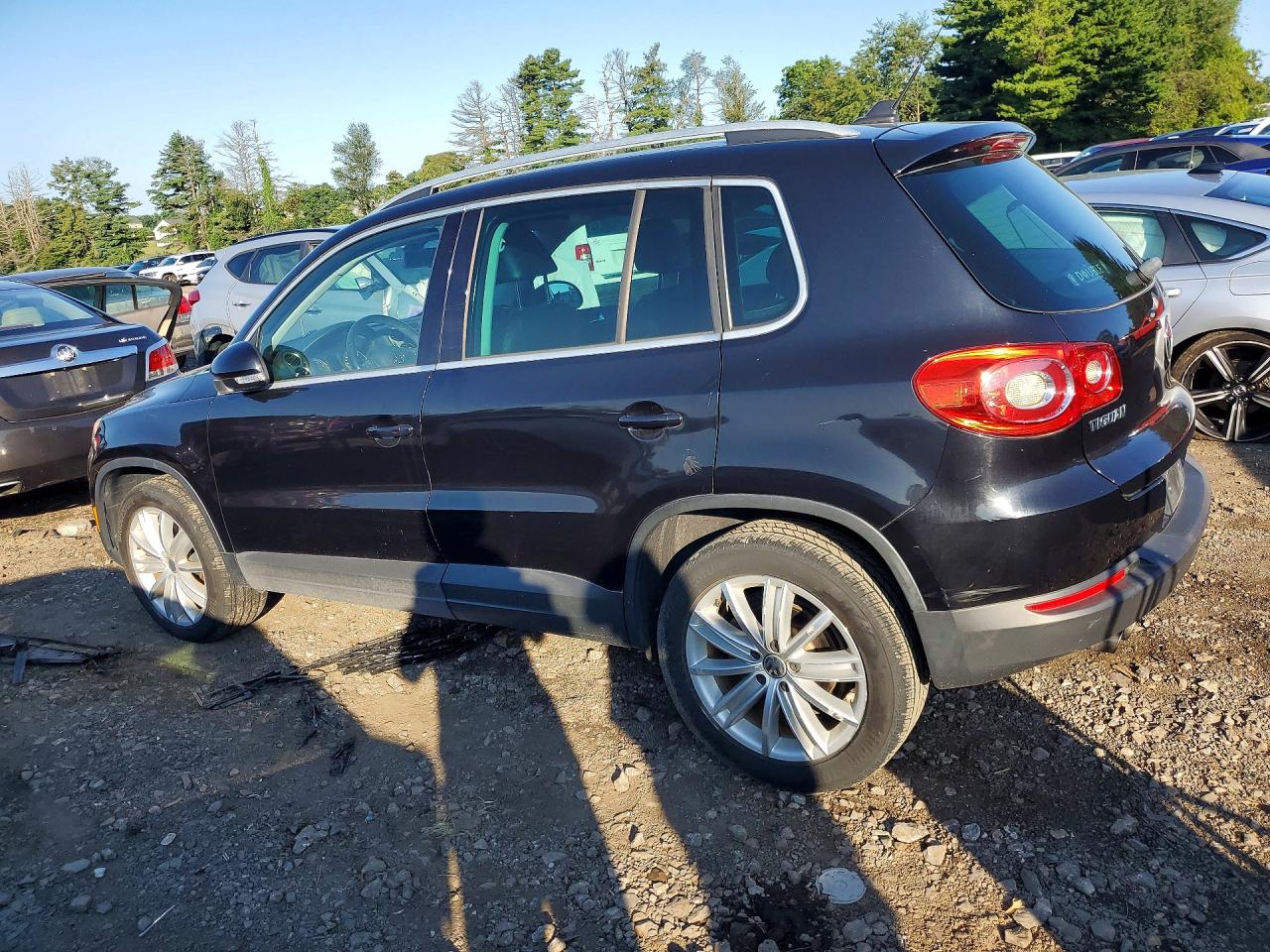 2011 Volkswagen Tiguan S Black vin: WVGAV7AX1BW550801