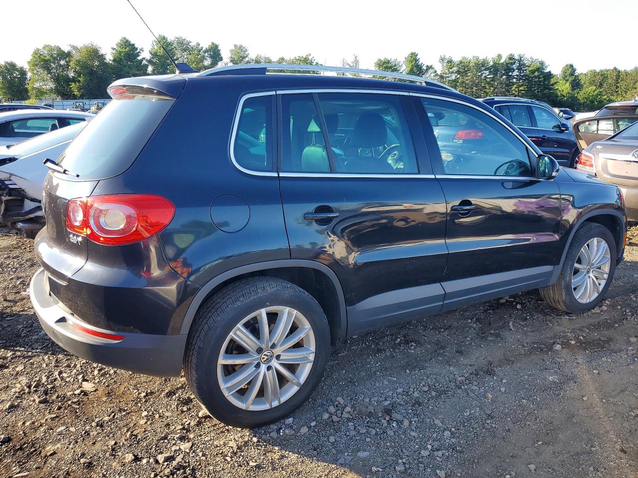 2011 Volkswagen Tiguan S Black vin: WVGAV7AX1BW550801