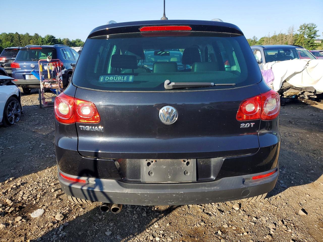 2011 Volkswagen Tiguan S Black vin: WVGAV7AX1BW550801
