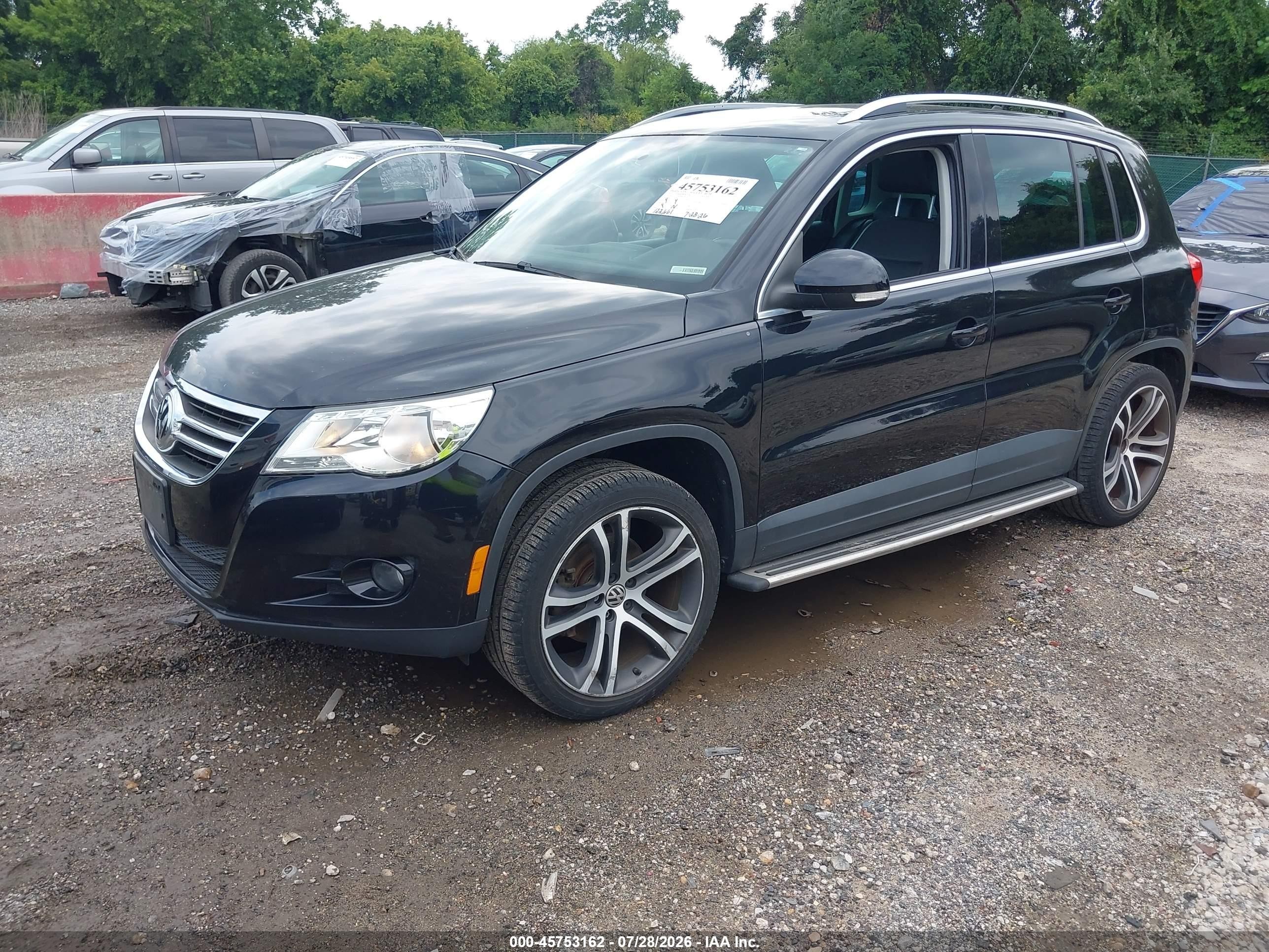 2011 Volkswagen Tiguan Se Черный vin: WVGAV7AX2BW528516