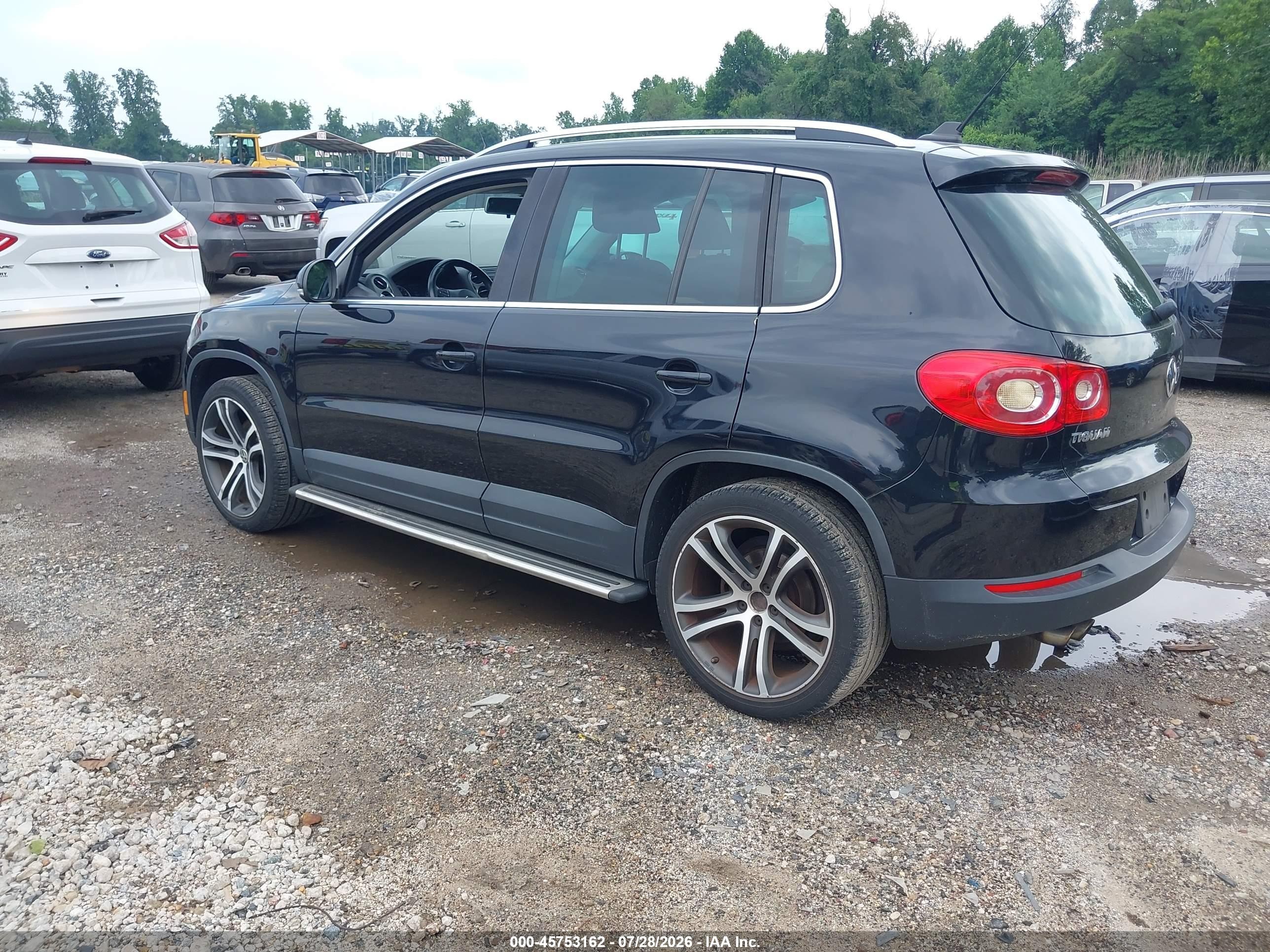 2011 Volkswagen Tiguan Se Черный vin: WVGAV7AX2BW528516