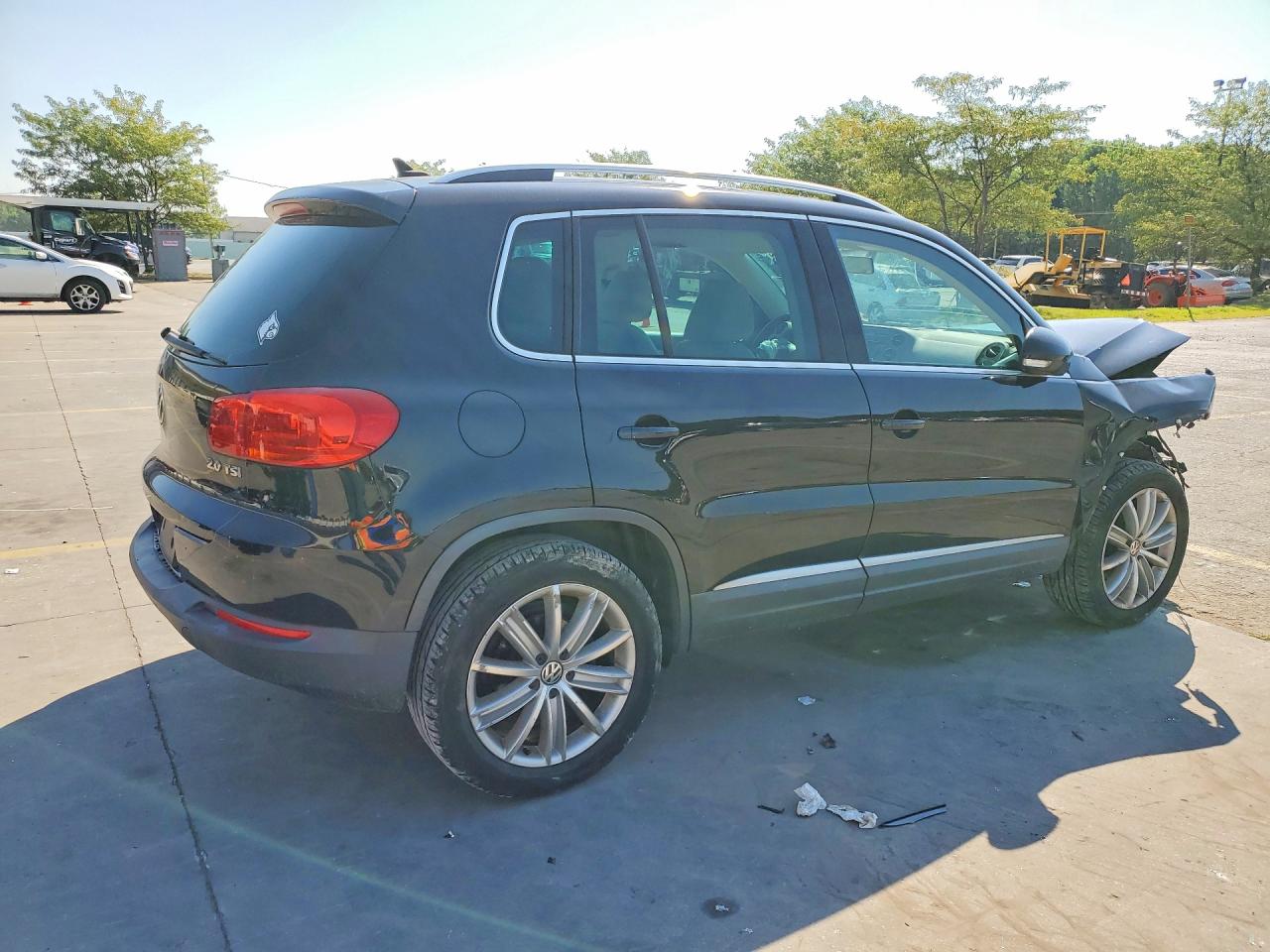 2012 Volkswagen Tiguan S Черный vin: WVGAV7AX2CW530039