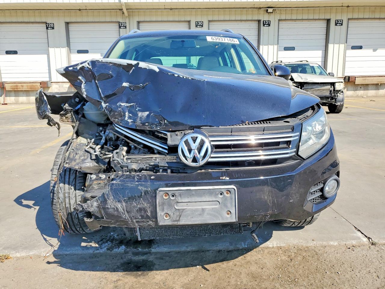 2012 Volkswagen Tiguan S Черный vin: WVGAV7AX2CW530039