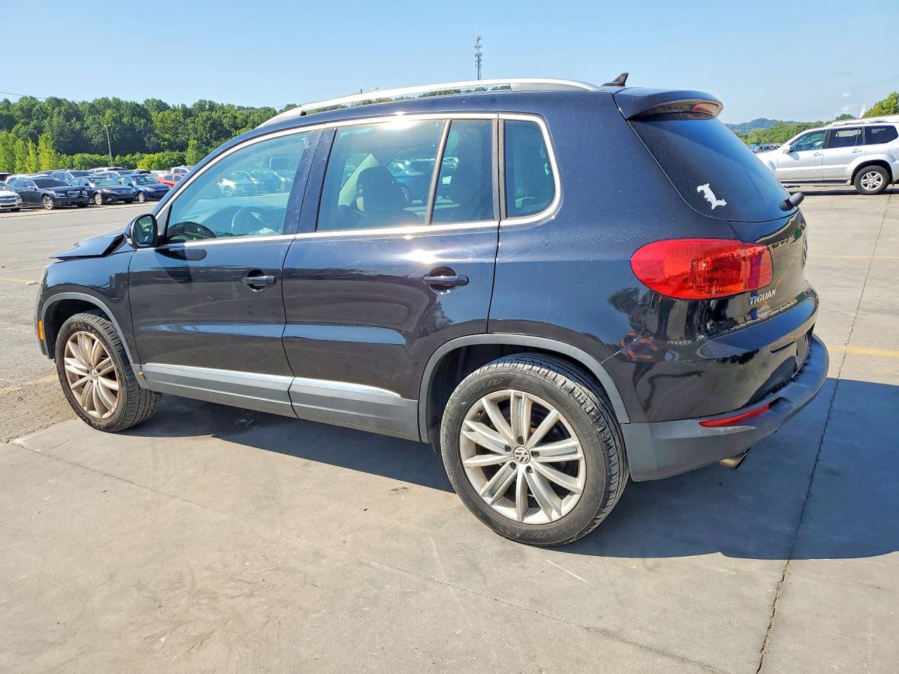 2012 Volkswagen Tiguan S Черный vin: WVGAV7AX2CW530039