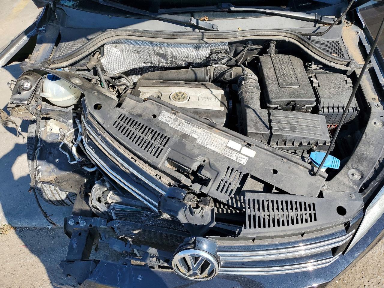 2012 Volkswagen Tiguan S Черный vin: WVGAV7AX2CW530039