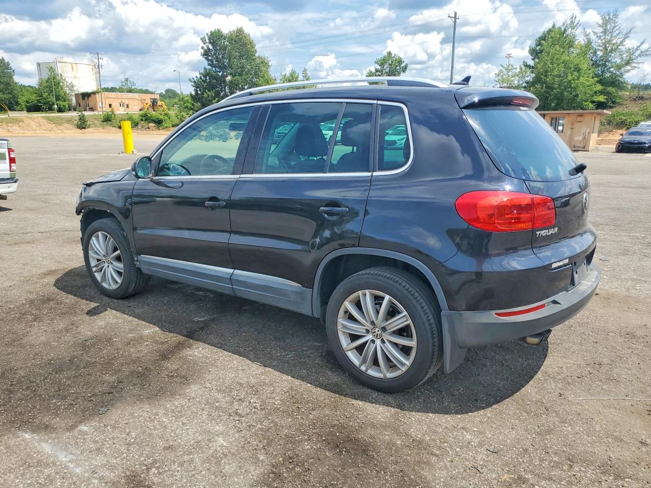2015 Volkswagen Tiguan S Черный vin: WVGAV7AX2FW561859