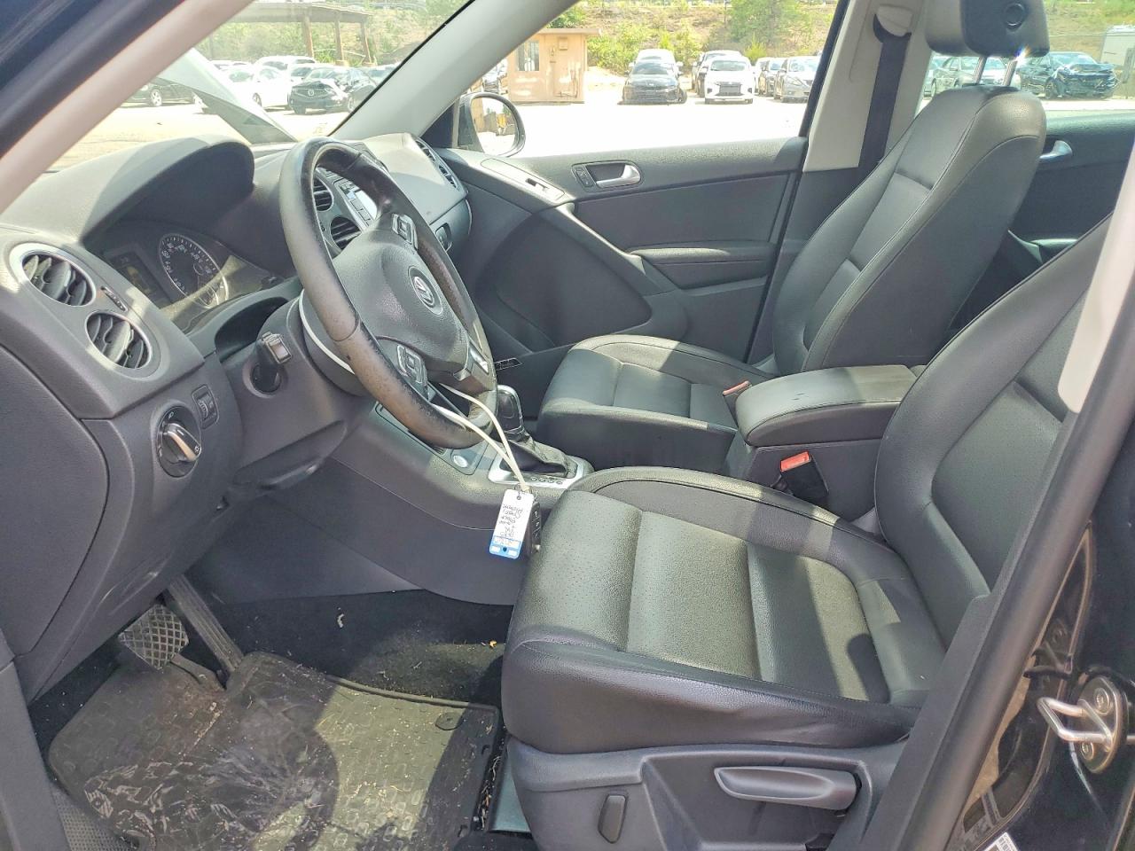 2015 Volkswagen Tiguan S Черный vin: WVGAV7AX2FW561859
