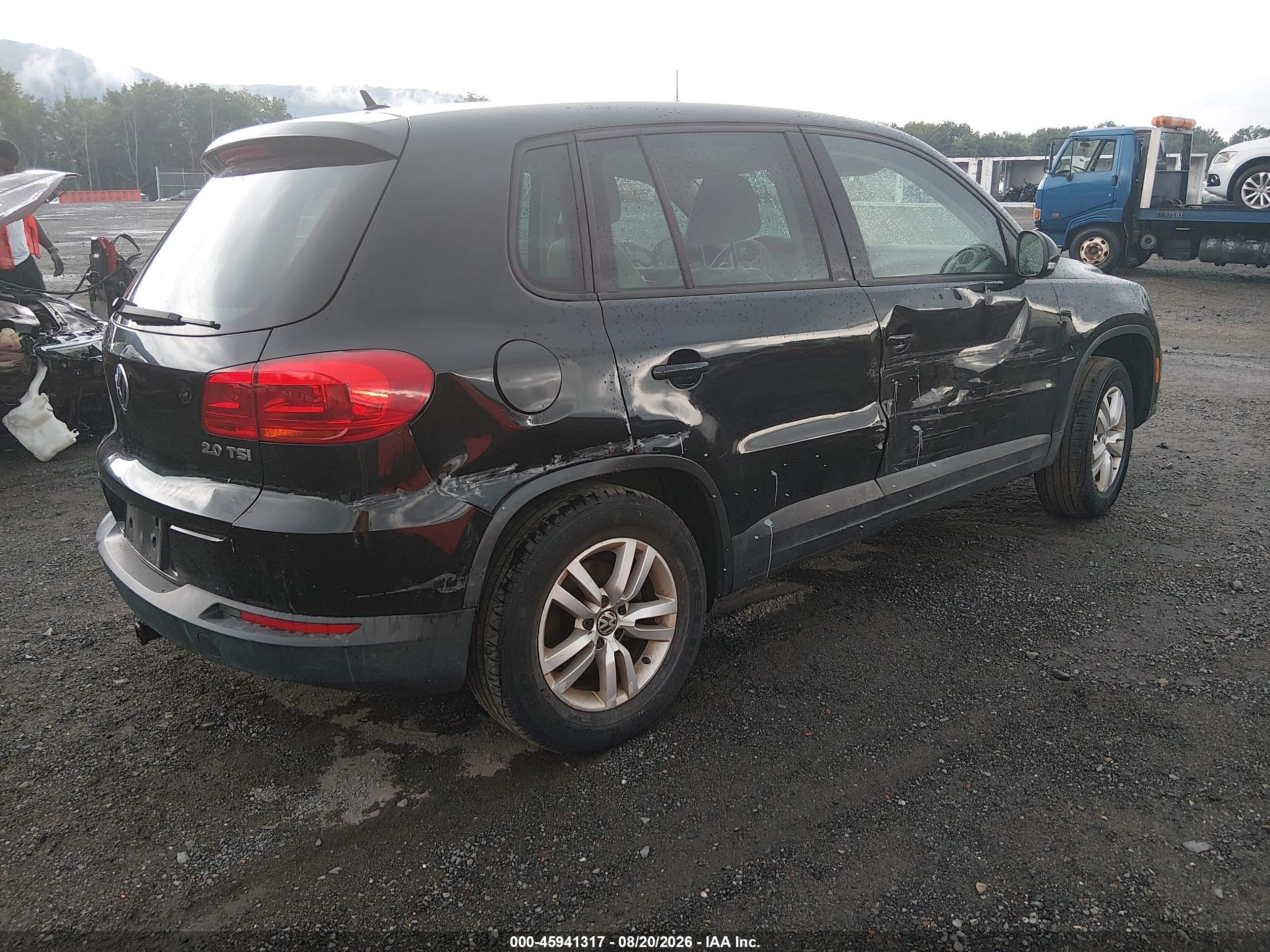 2012 Volkswagen Tiguan Le Black vin: WVGAV7AX3CW568640