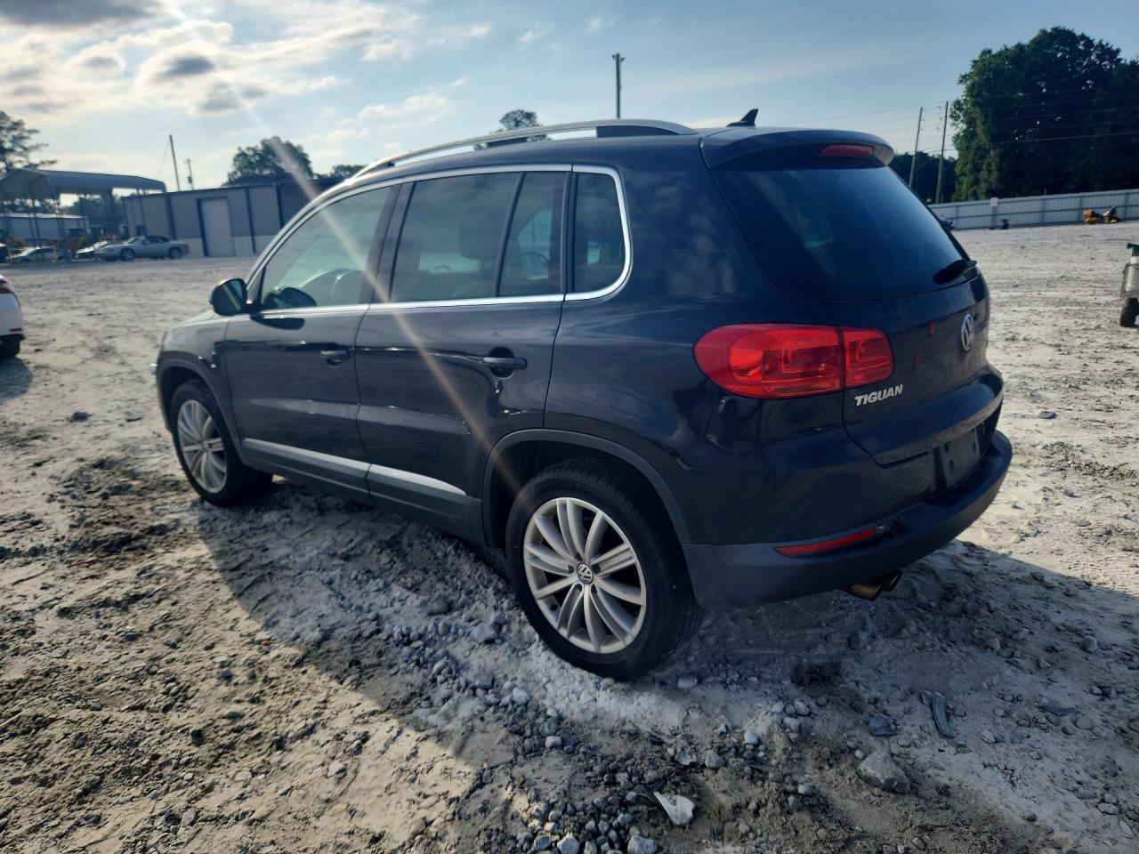 2012 Volkswagen Tiguan S Black vin: WVGAV7AX3CW611230