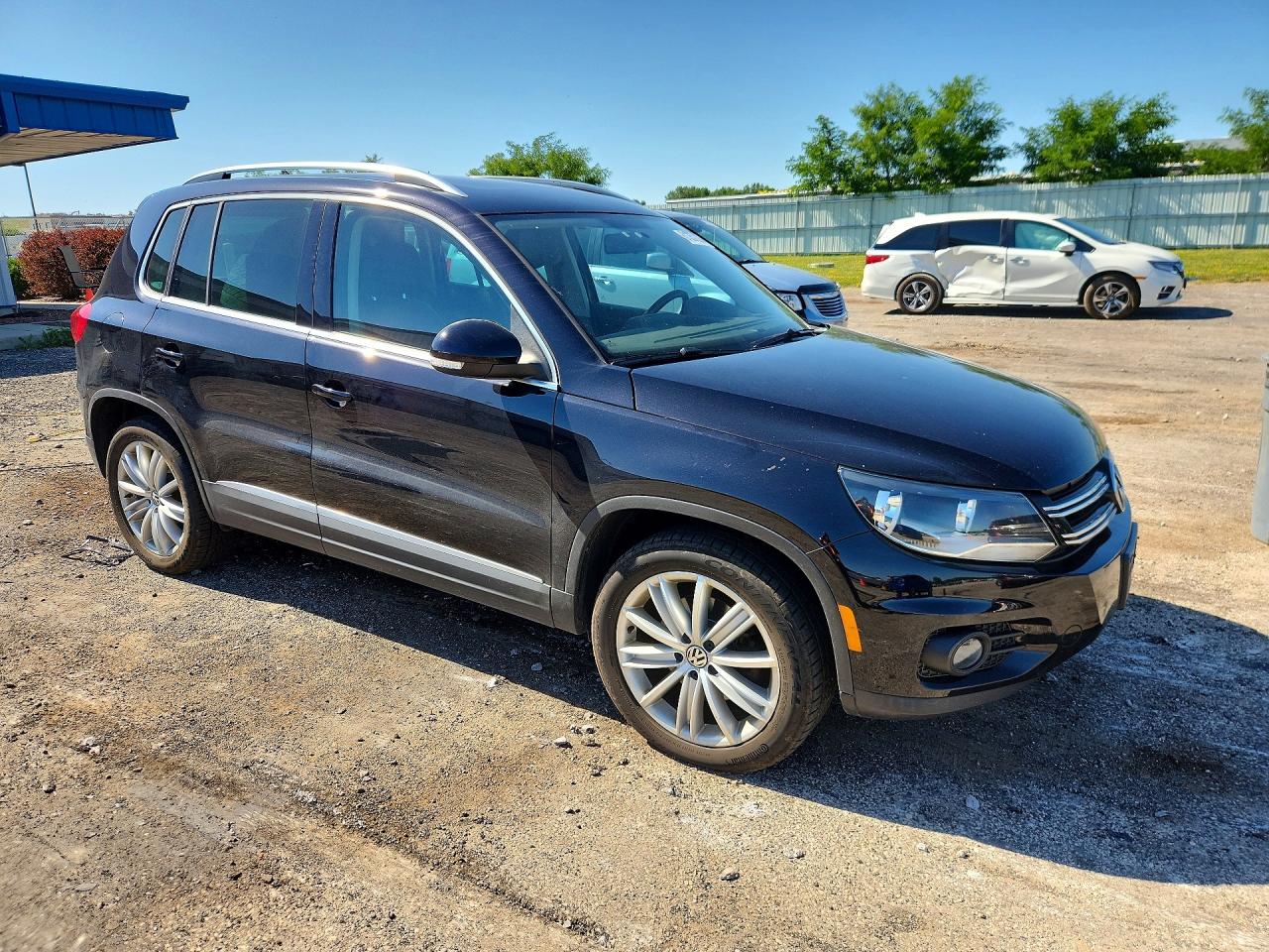 2012 Volkswagen Tiguan S Black vin: WVGAV7AX4CW532388