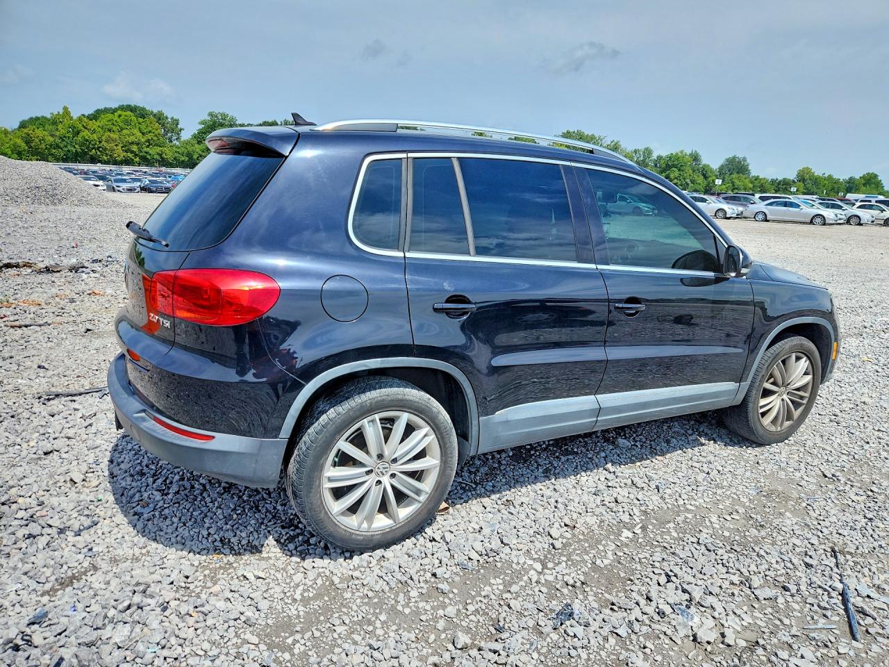 2012 Volkswagen Tiguan S Black vin: WVGAV7AX6CW516502