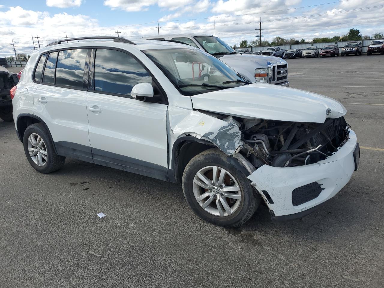 2016 Volkswagen Tiguan S White vin: WVGAV7AX6GW600230 Damage: Hood, Severe Damage, Replacement Required