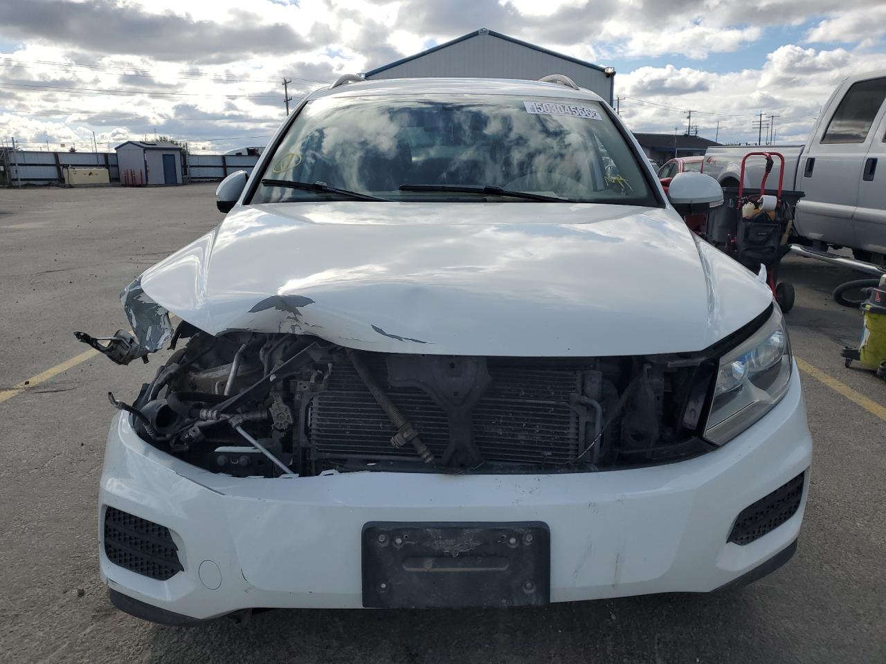 2016 Volkswagen Tiguan S White vin: WVGAV7AX6GW600230 Damage: Front Bumper/Cover, Severe Damage, Replacement Required