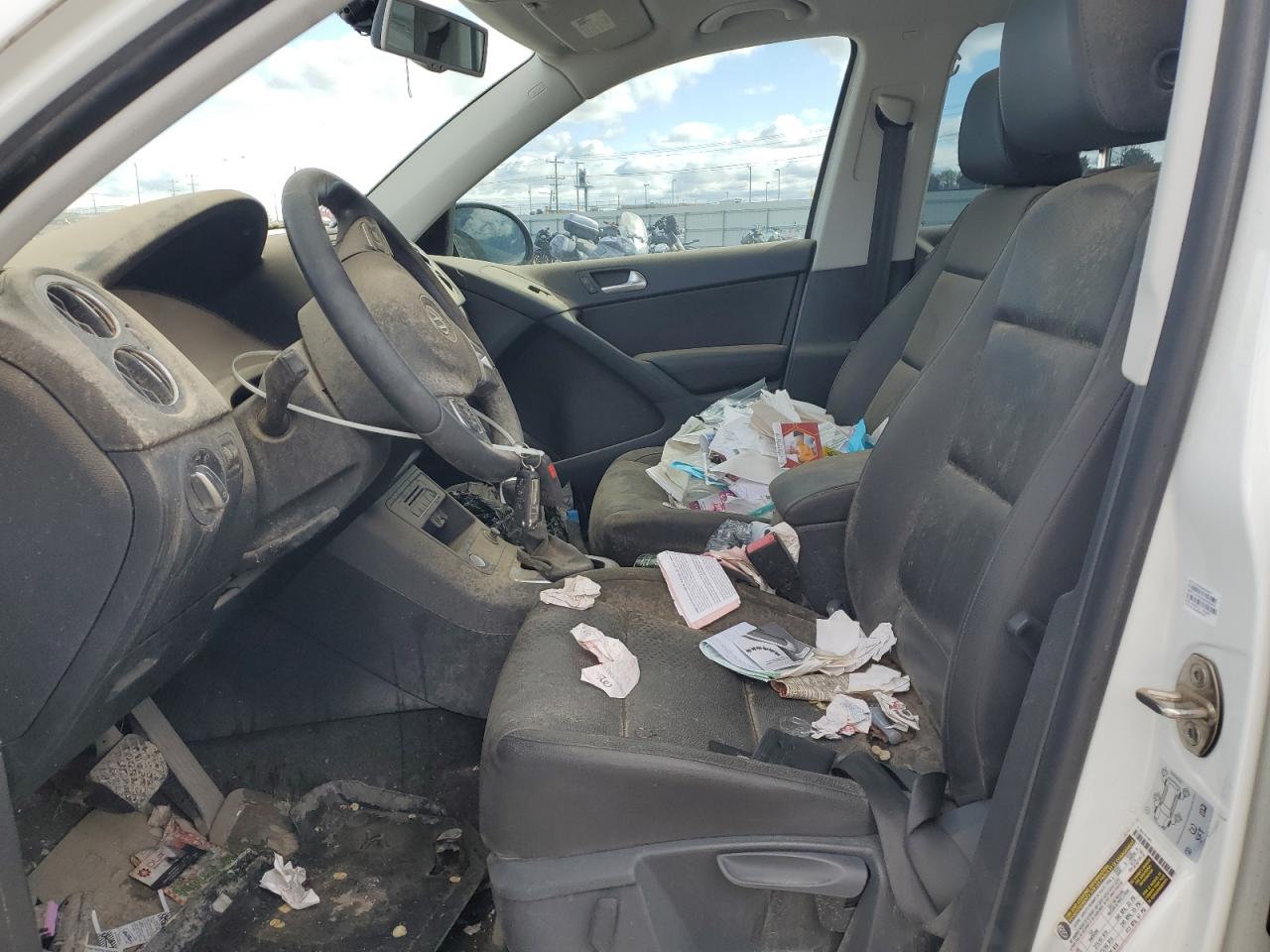 2016 Volkswagen Tiguan S White vin: WVGAV7AX6GW600230 Damage: Left Front Seat Cushion, Stained, Permanent