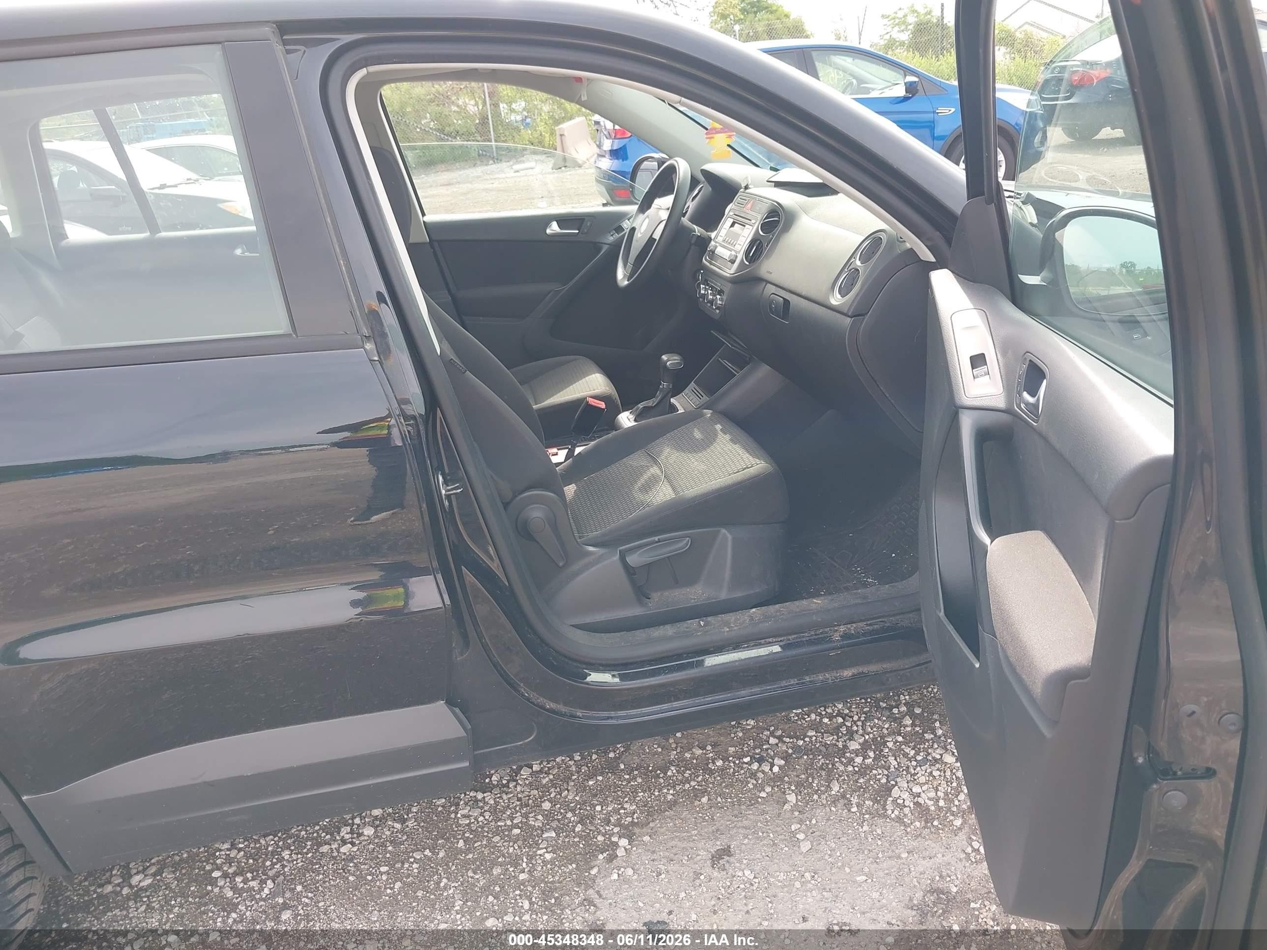 2010 Volkswagen Tiguan S Black vin: WVGAV7AX7AW002171