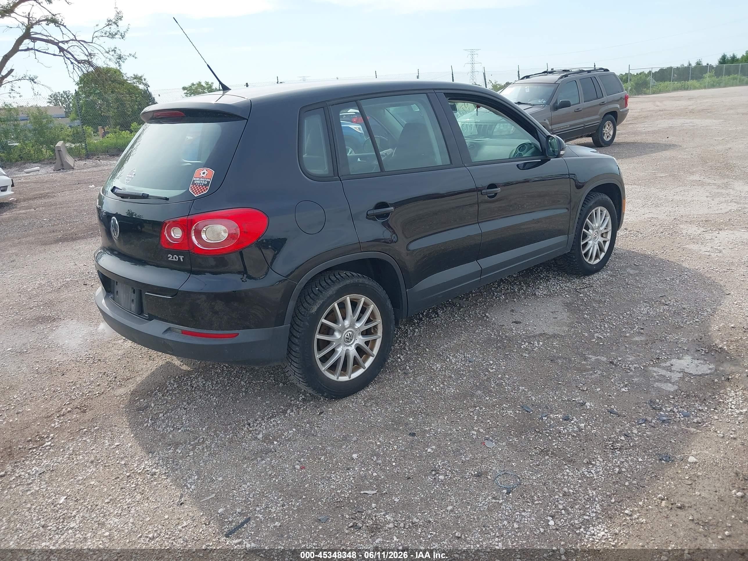 2010 Volkswagen Tiguan S Black vin: WVGAV7AX7AW002171