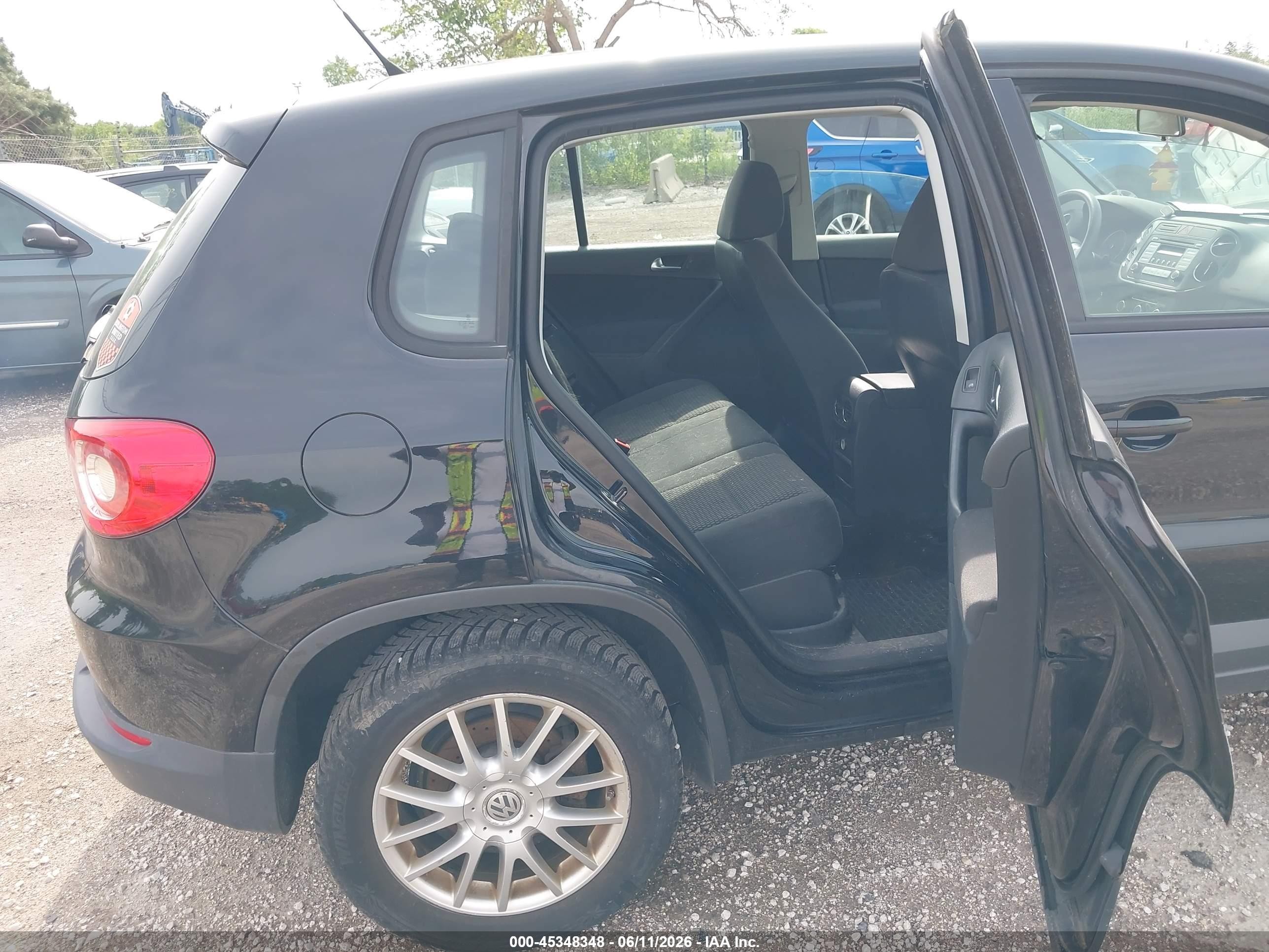 2010 Volkswagen Tiguan S Black vin: WVGAV7AX7AW002171