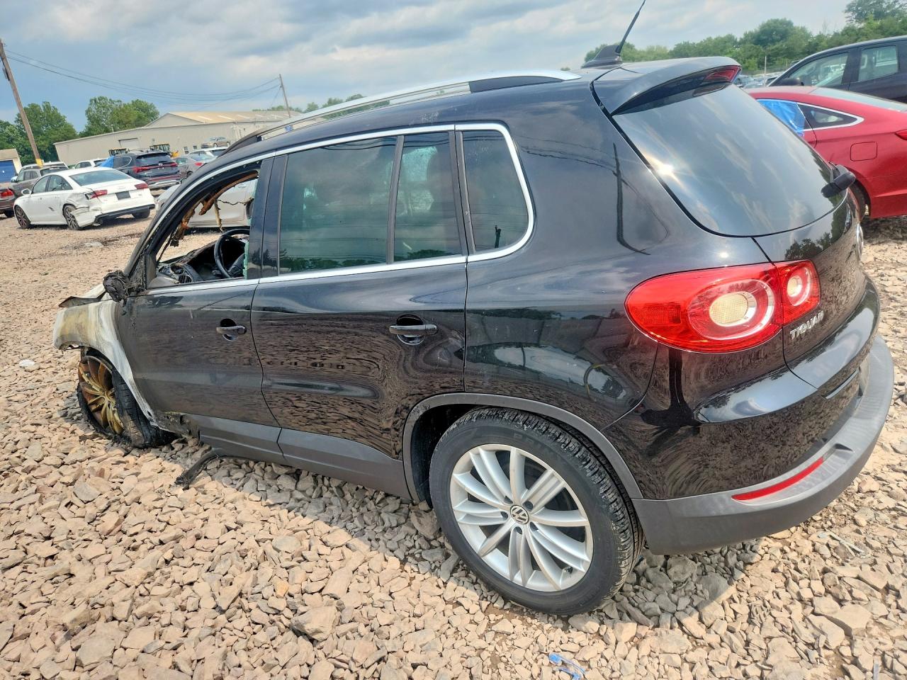 2011 Volkswagen Tiguan S Black vin: WVGAV7AX7BW515440