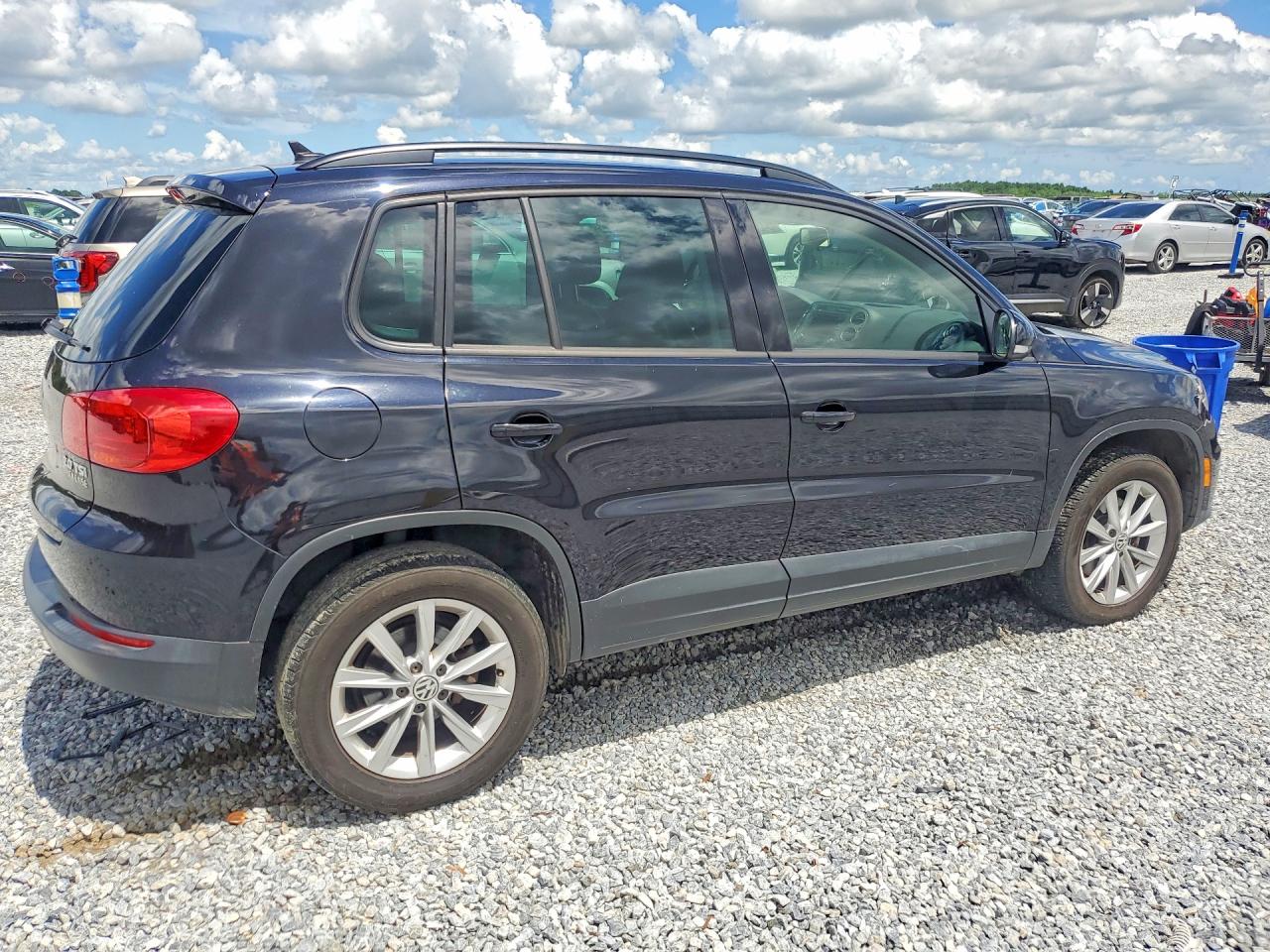 2015 Volkswagen Tiguan S Black vin: WVGAV7AX7FW559833