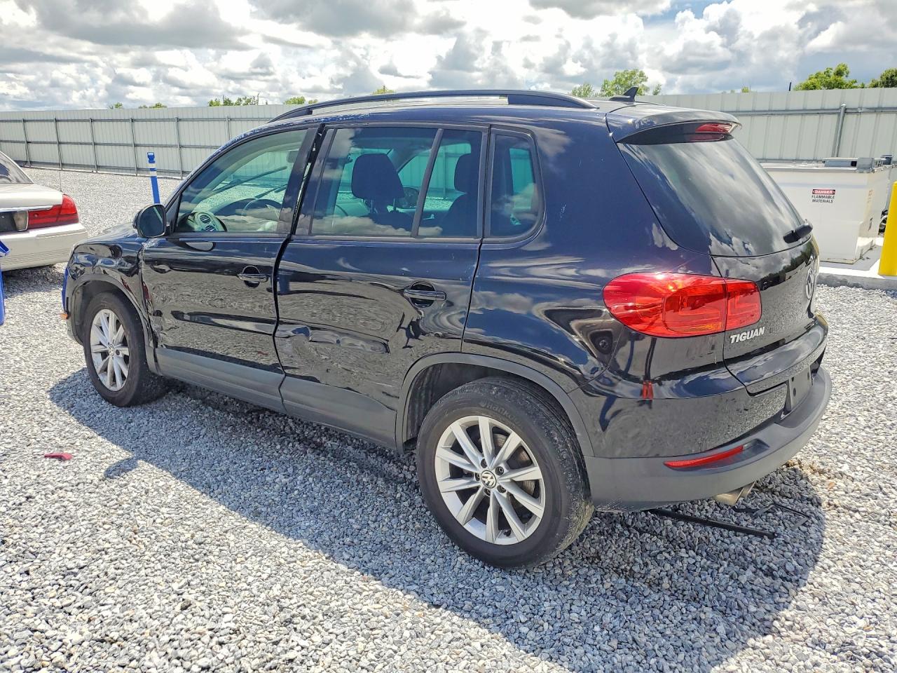 2015 Volkswagen Tiguan S Black vin: WVGAV7AX7FW559833