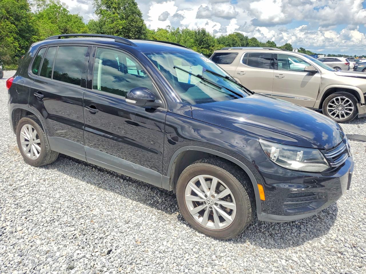2015 Volkswagen Tiguan S Black vin: WVGAV7AX7FW559833