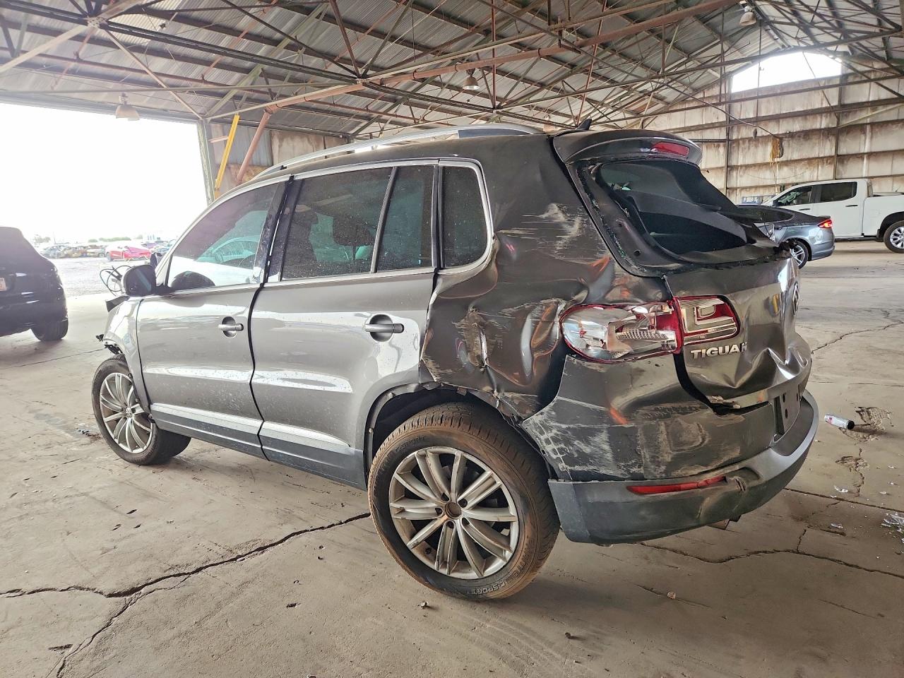 2012 Volkswagen Tiguan S Серый vin: WVGAV7AX8CW006023