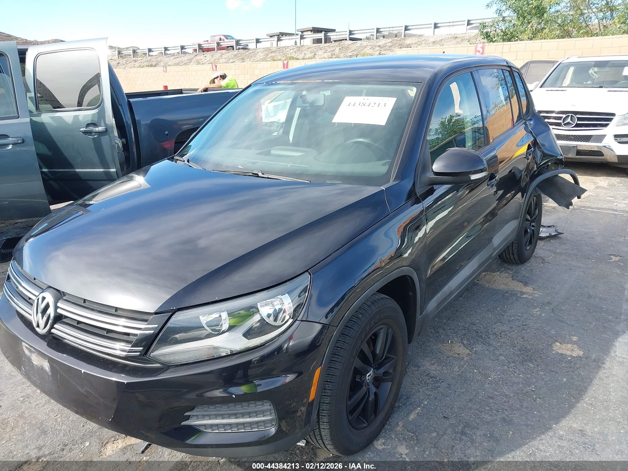 2013 Volkswagen Tiguan S Black vin: WVGAV7AX8DW530192