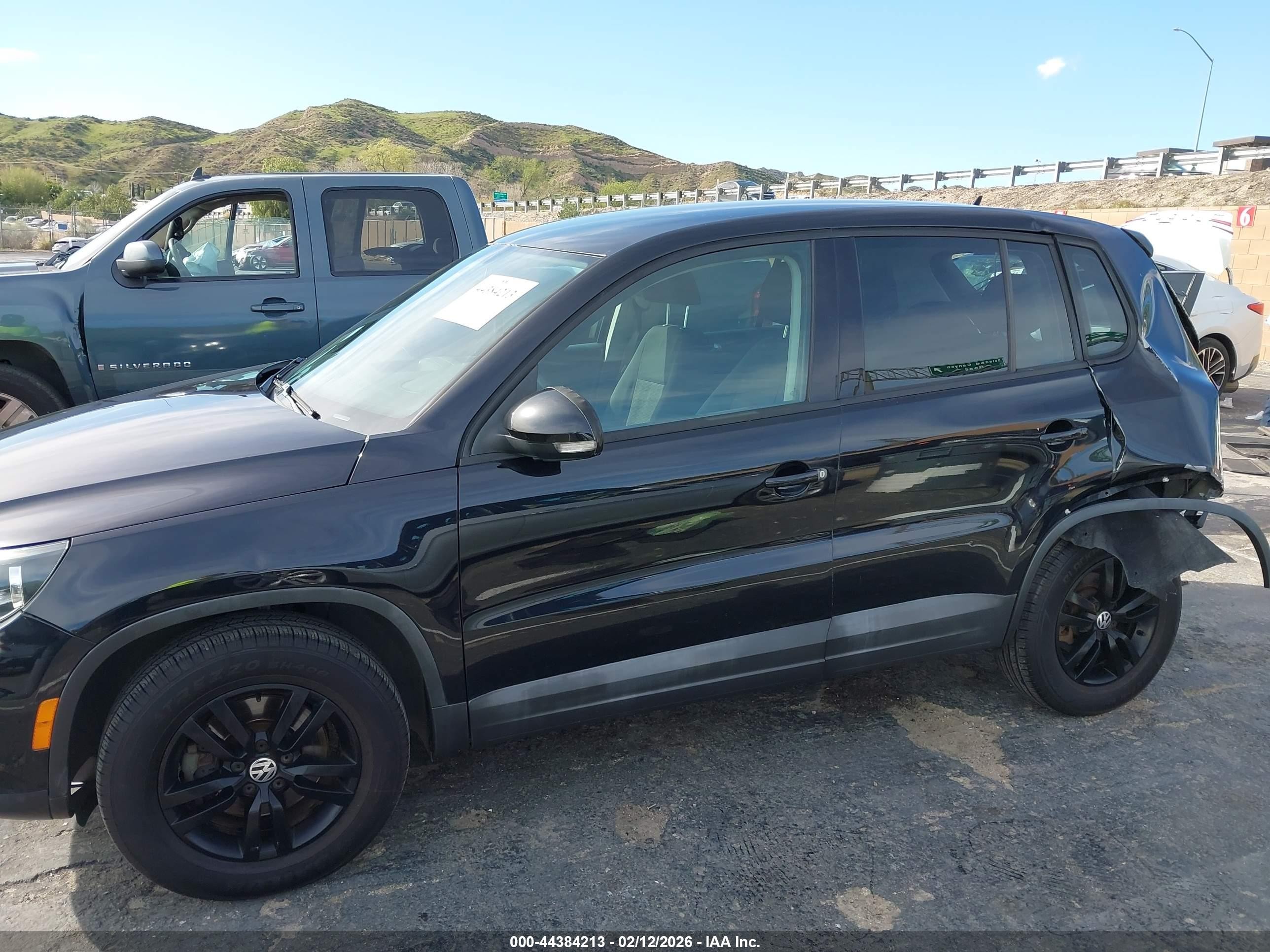 2013 Volkswagen Tiguan S Black vin: WVGAV7AX8DW530192