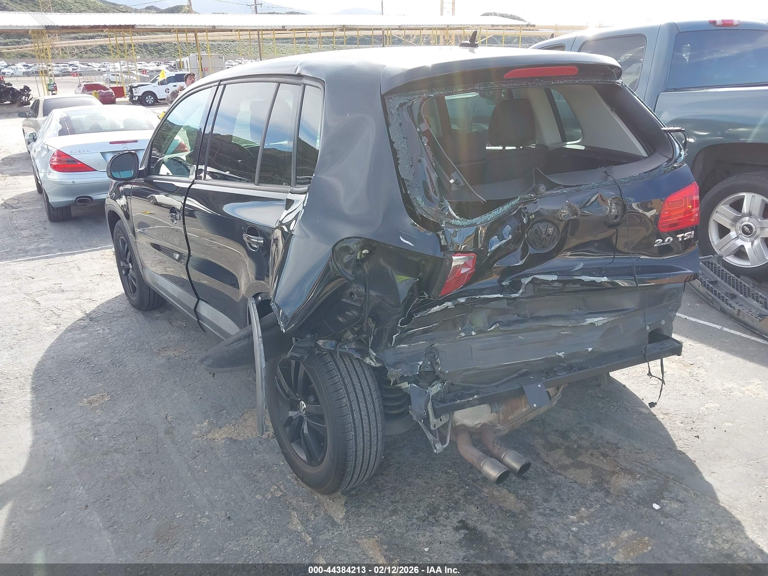 2013 Volkswagen Tiguan S Black vin: WVGAV7AX8DW530192