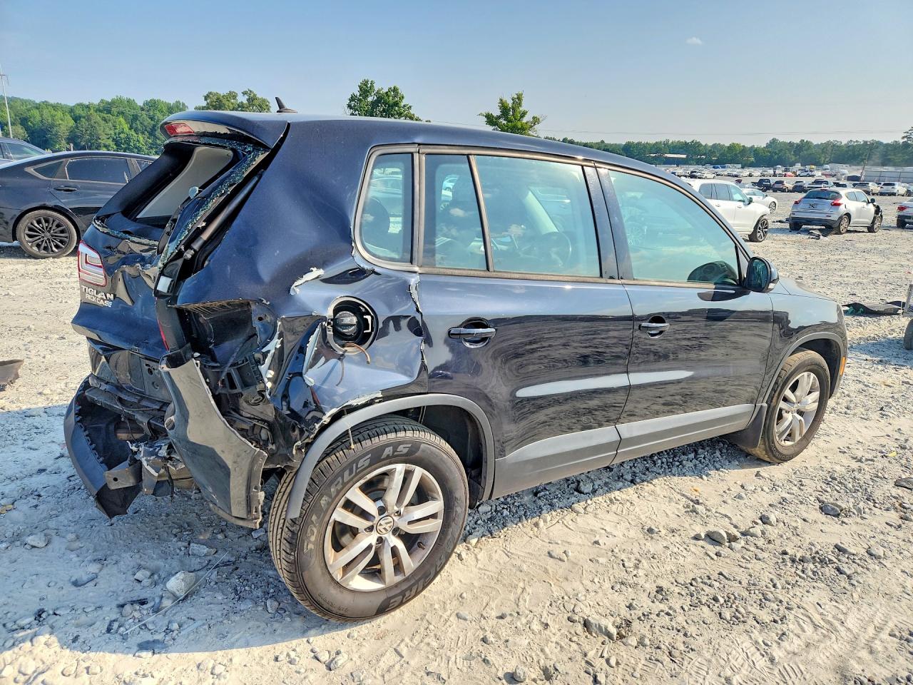 2013 Volkswagen Tiguan S Black vin: WVGAV7AX8DW553973