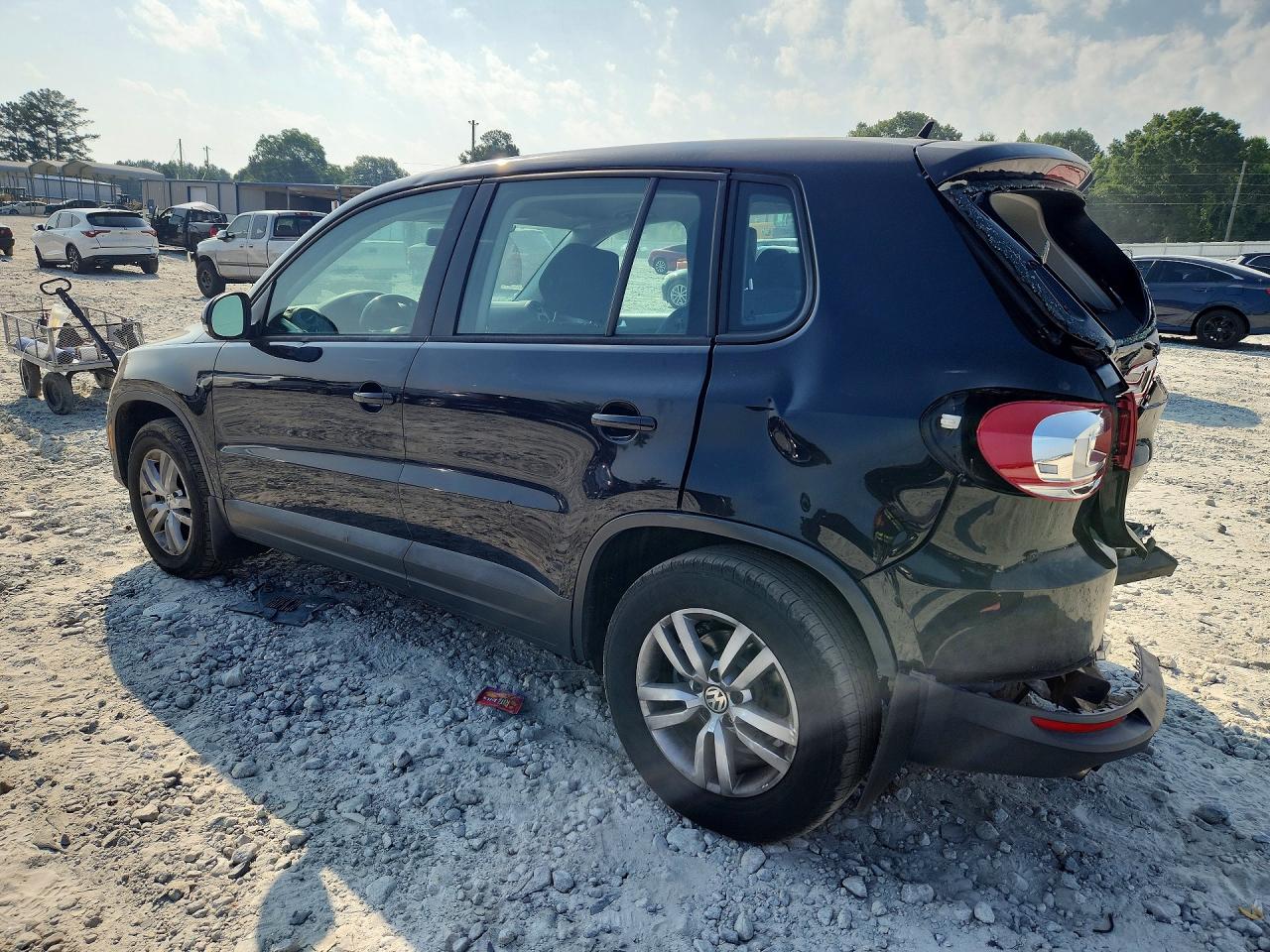 2013 Volkswagen Tiguan S Black vin: WVGAV7AX8DW553973